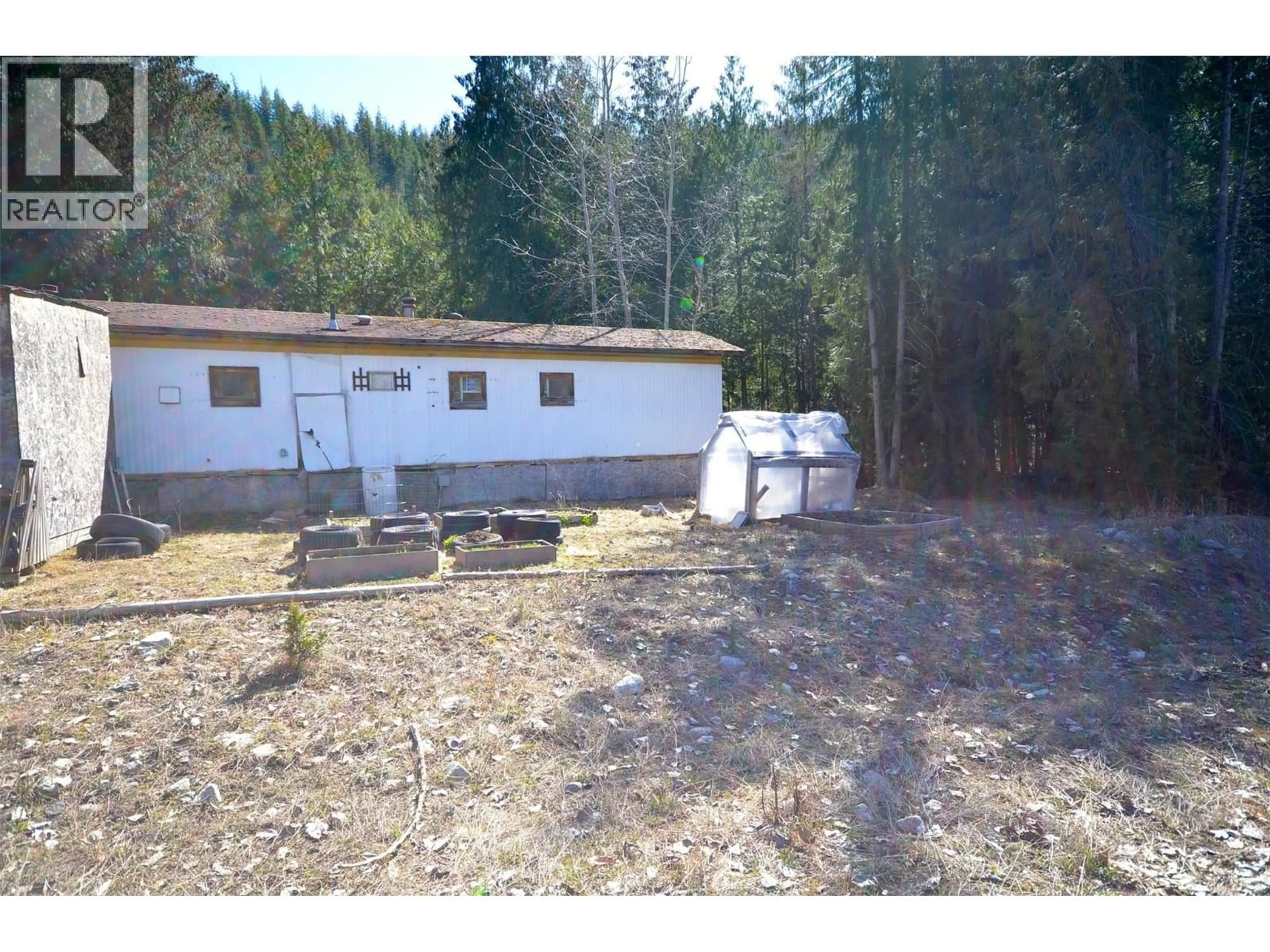A pic from outside/outdoor area/front of a property/back of a property/a pic from drone, building for 1538 CREIGHTON VALLEY ROAD, Lumby British Columbia V0E2G1