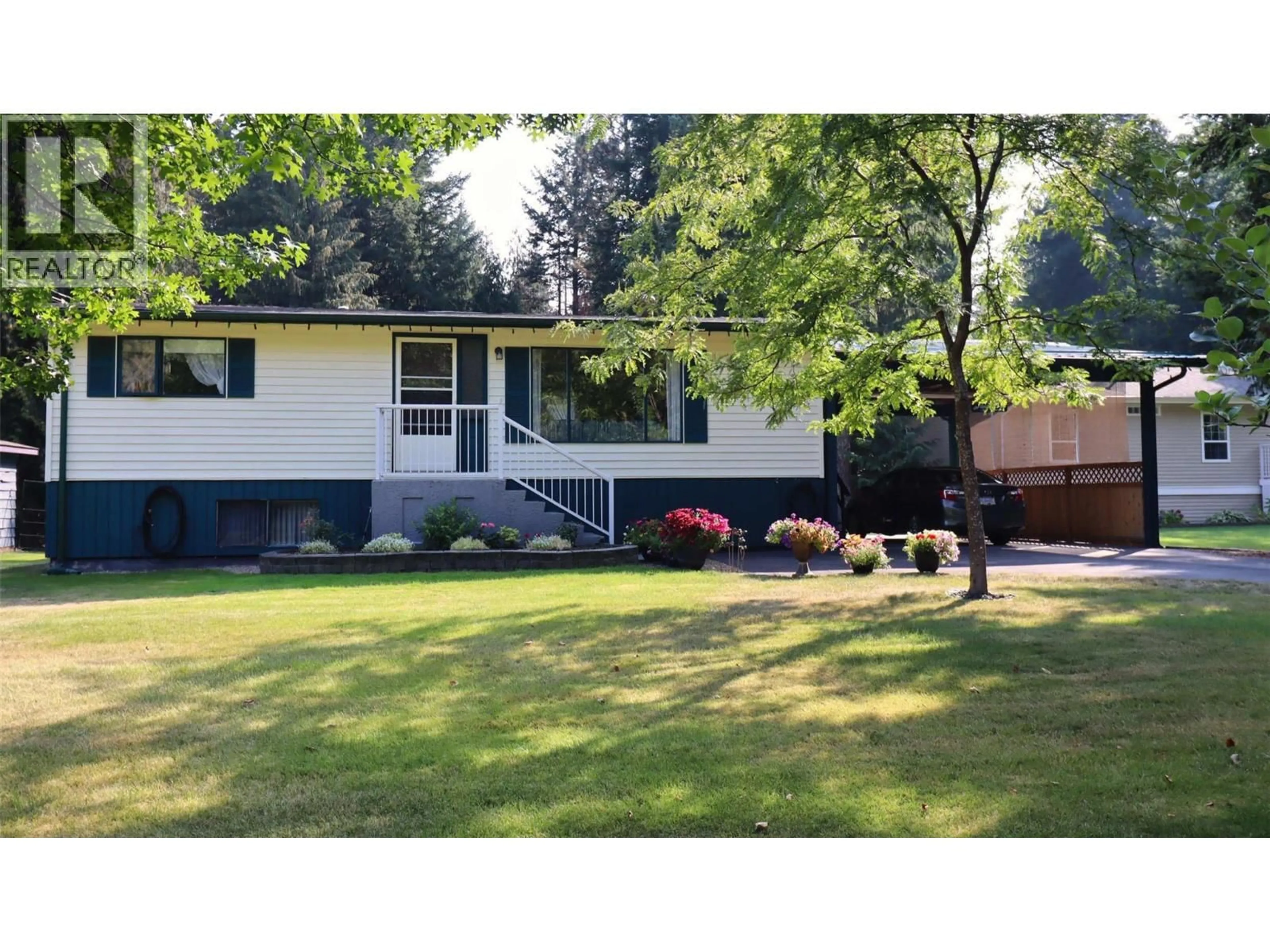 Home with vinyl exterior material, street for 4090 BUTTERS ROAD, Scotch Creek British Columbia V0E1M5