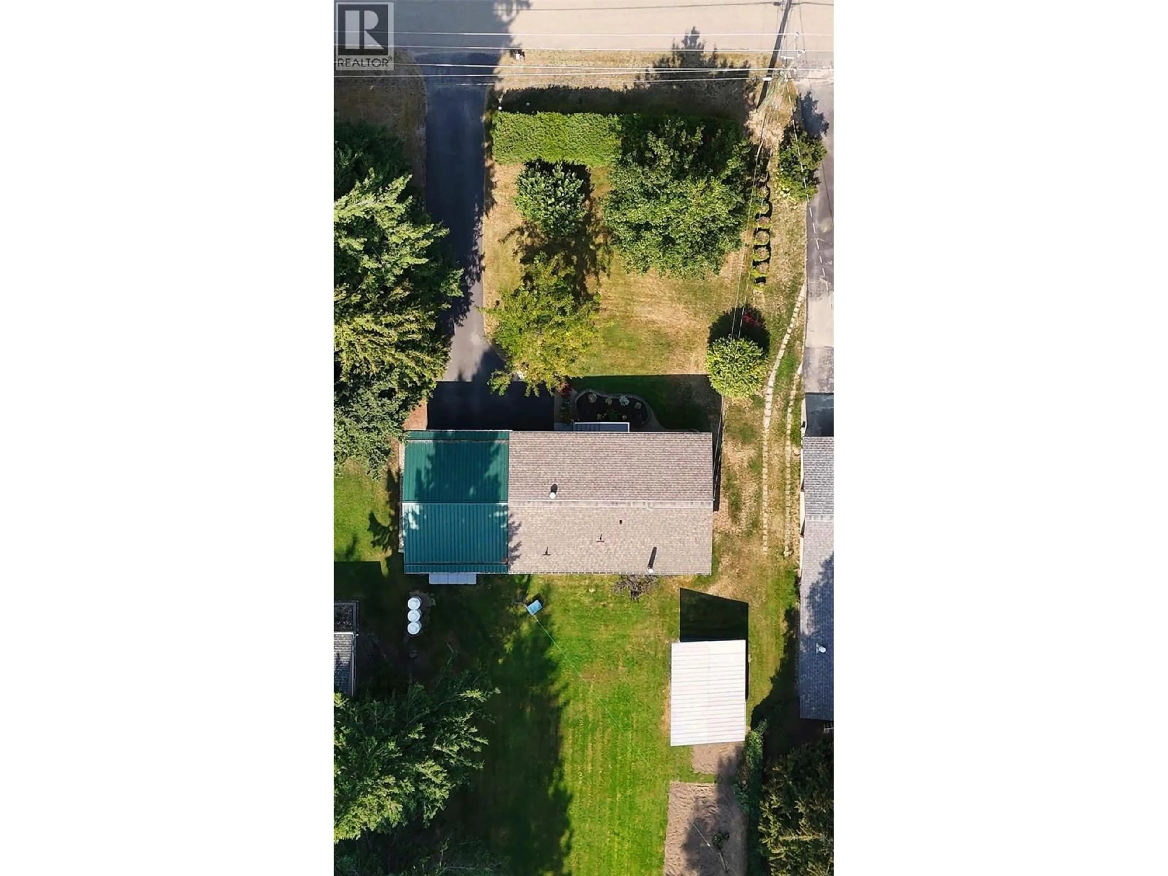 A pic from outside/outdoor area/front of a property/back of a property/a pic from drone, street for 4090 BUTTERS ROAD, Scotch Creek British Columbia V0E1M5
