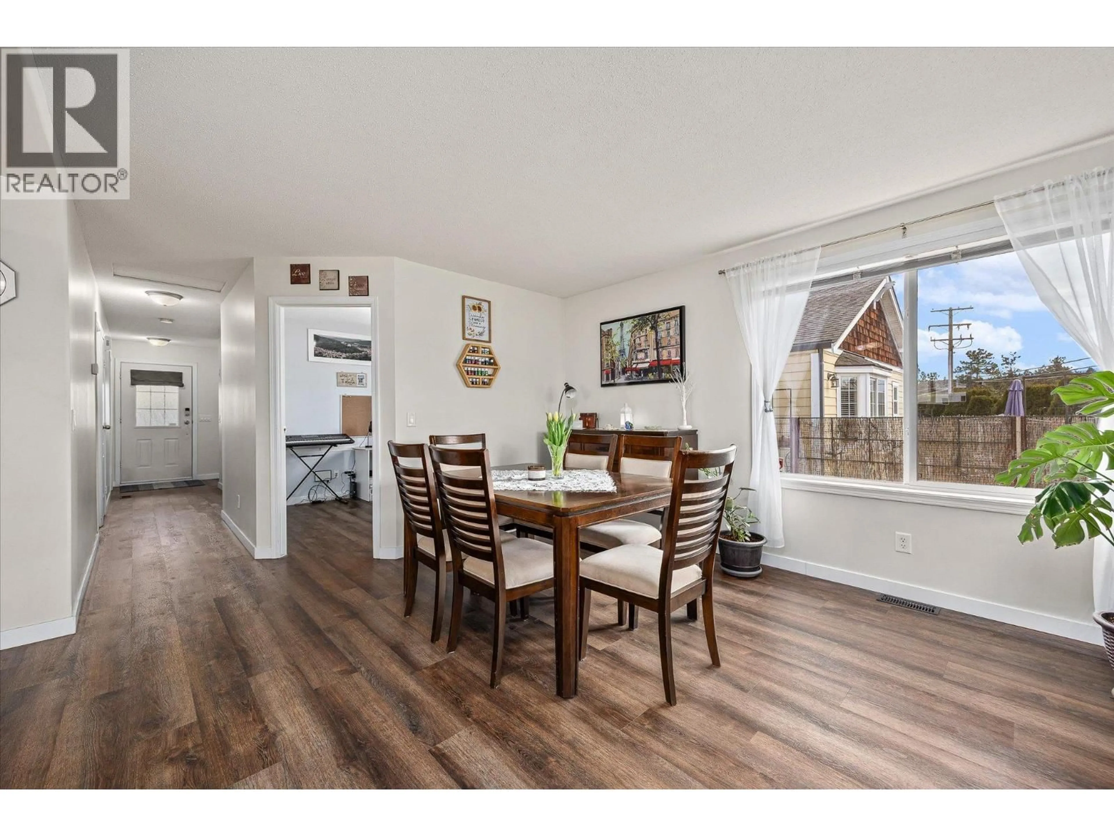 Dining room, wood/laminate floor for 2199 MIMOSA DRIVE, Westbank British Columbia V4T3A5