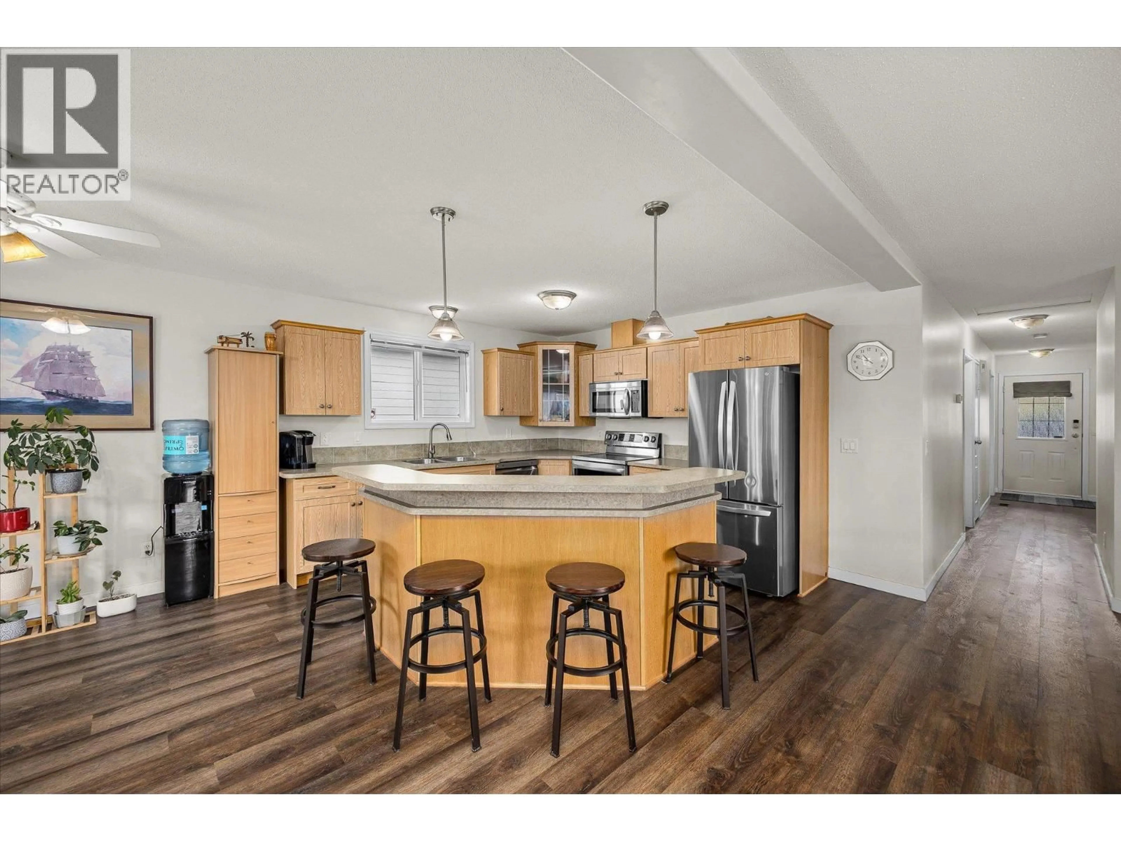 Open concept kitchen, wood/laminate floor for 2199 MIMOSA DRIVE, Westbank British Columbia V4T3A5