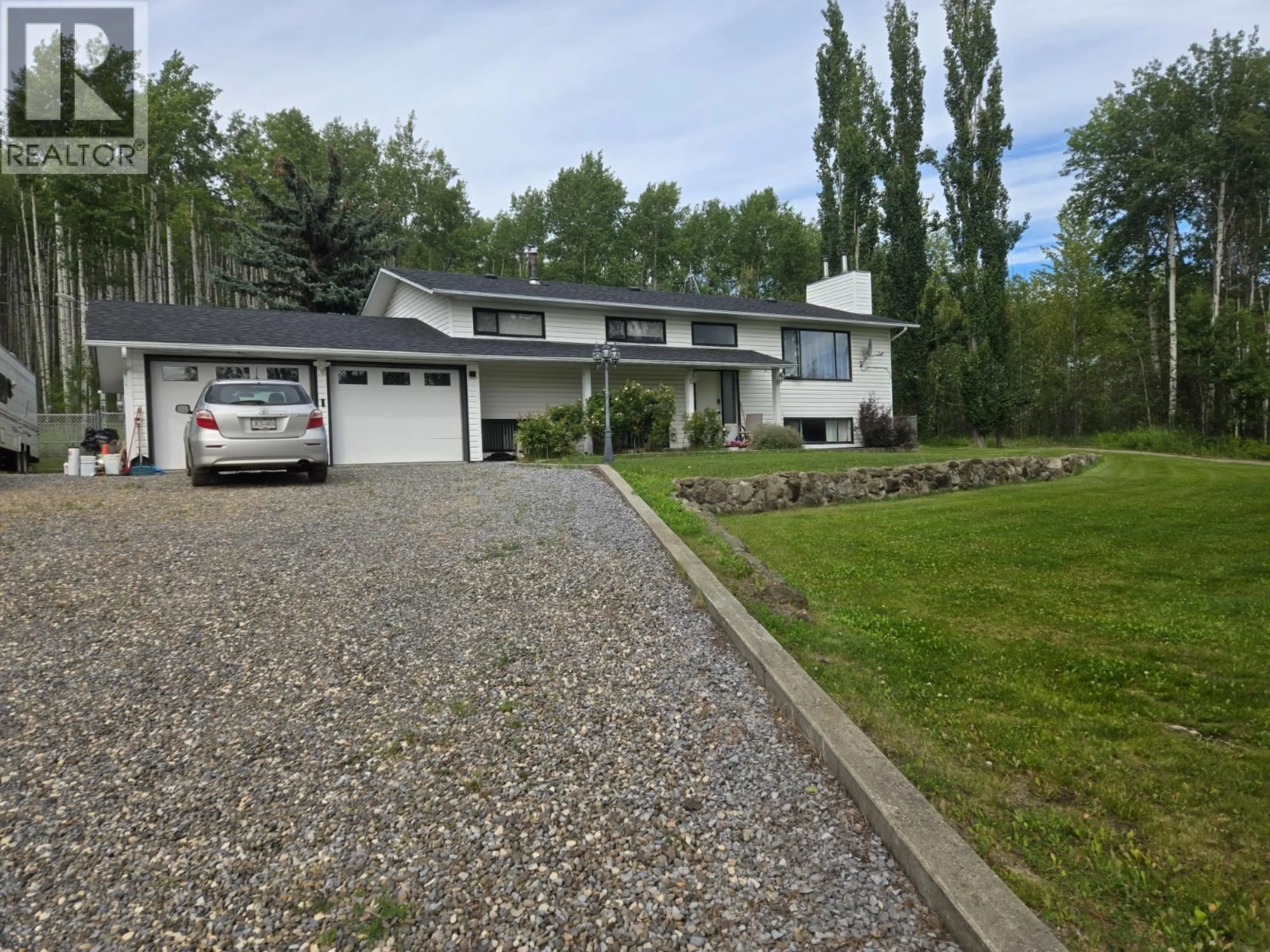 A pic from outside/outdoor area/front of a property/back of a property/a pic from drone, street for 5334 KURJATA DRIVE, Chetwynd British Columbia V0C1J0