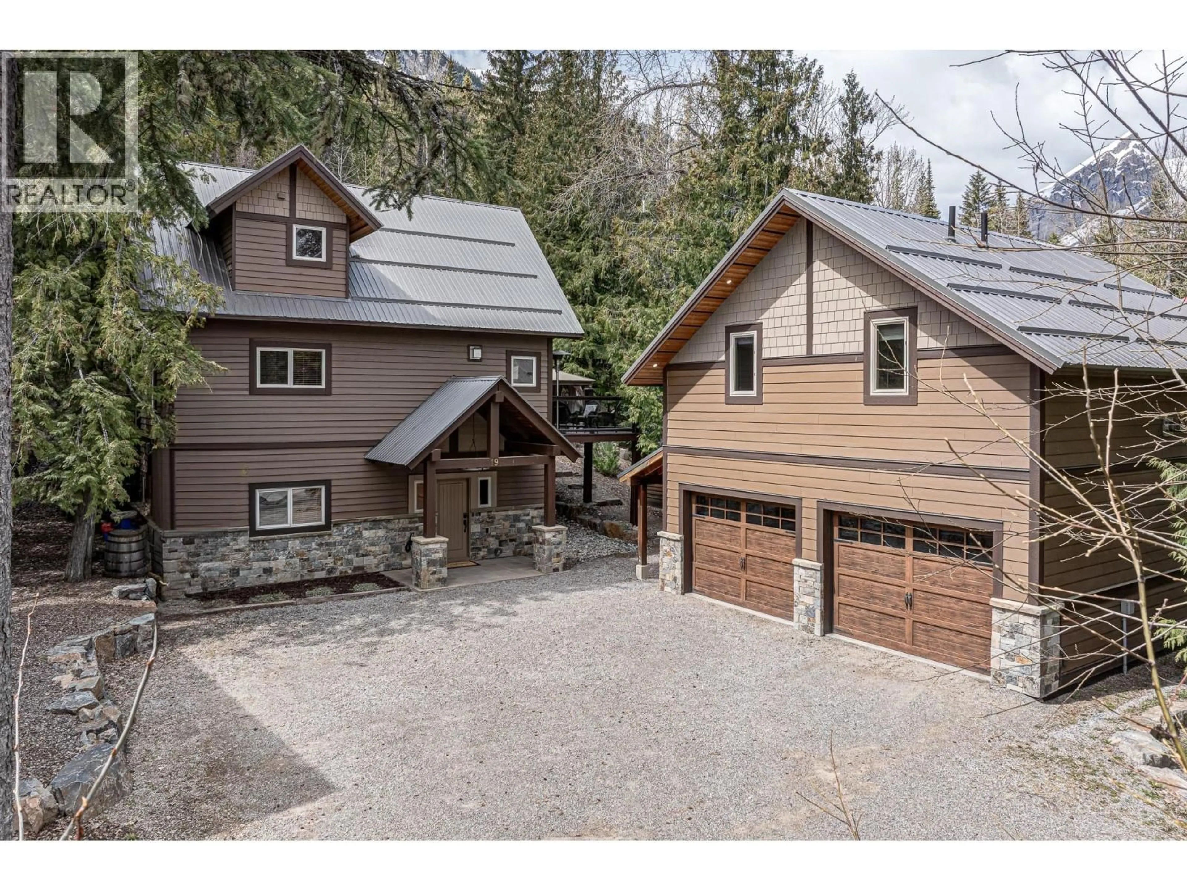 A pic from outside/outdoor area/front of a property/back of a property/a pic from drone, street for 19 ALPINE TRAIL CRESCENT, Fernie British Columbia V0B1M5