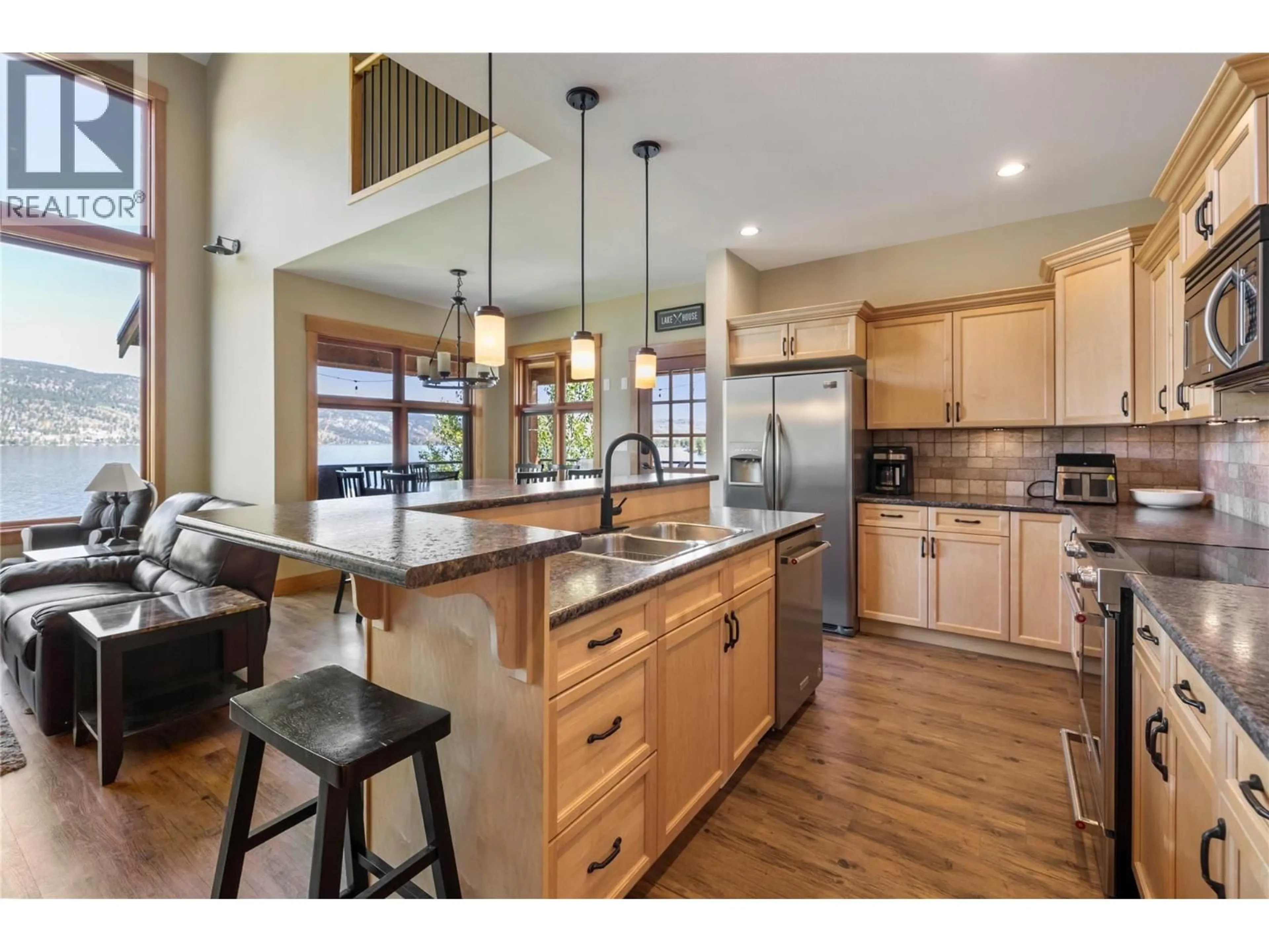 Open concept kitchen, wood/laminate floor for 6969 OLD NICOLA TRAIL, Merritt British Columbia V0E2R0