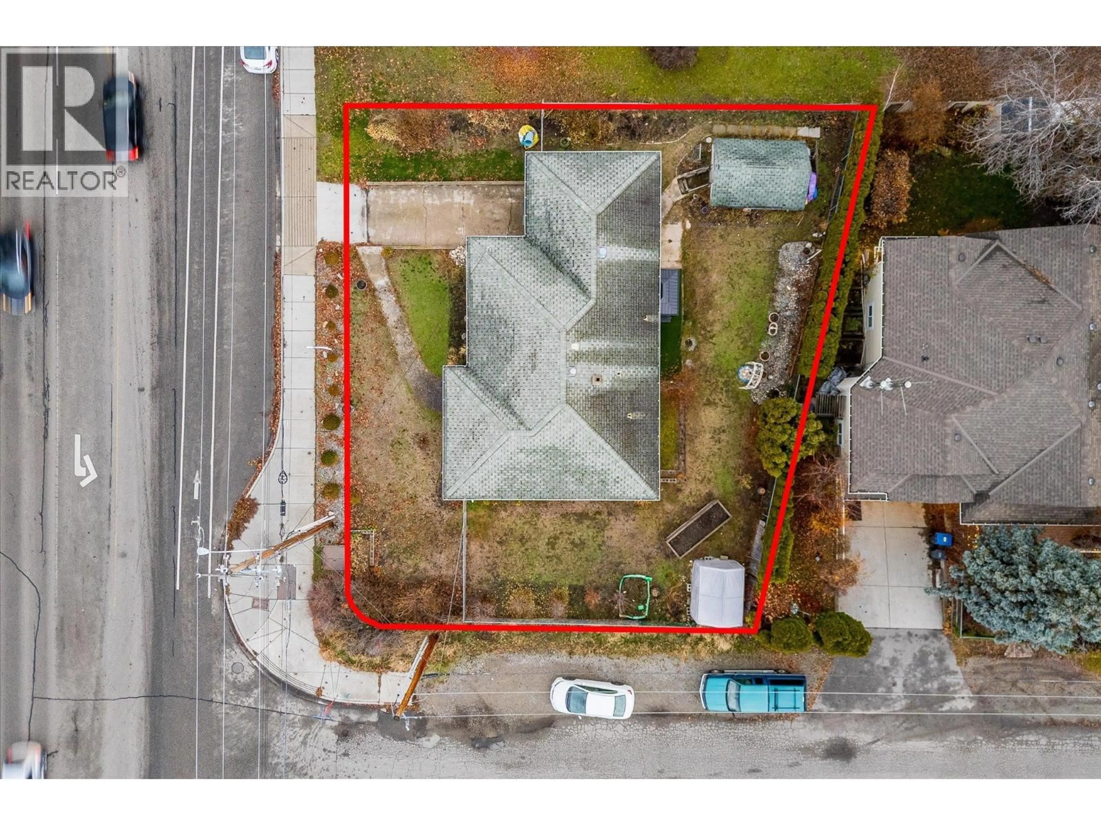 A pic from outside/outdoor area/front of a property/back of a property/a pic from drone, street for 1190 GUISACHAN ROAD, Kelowna British Columbia V1Y7X4