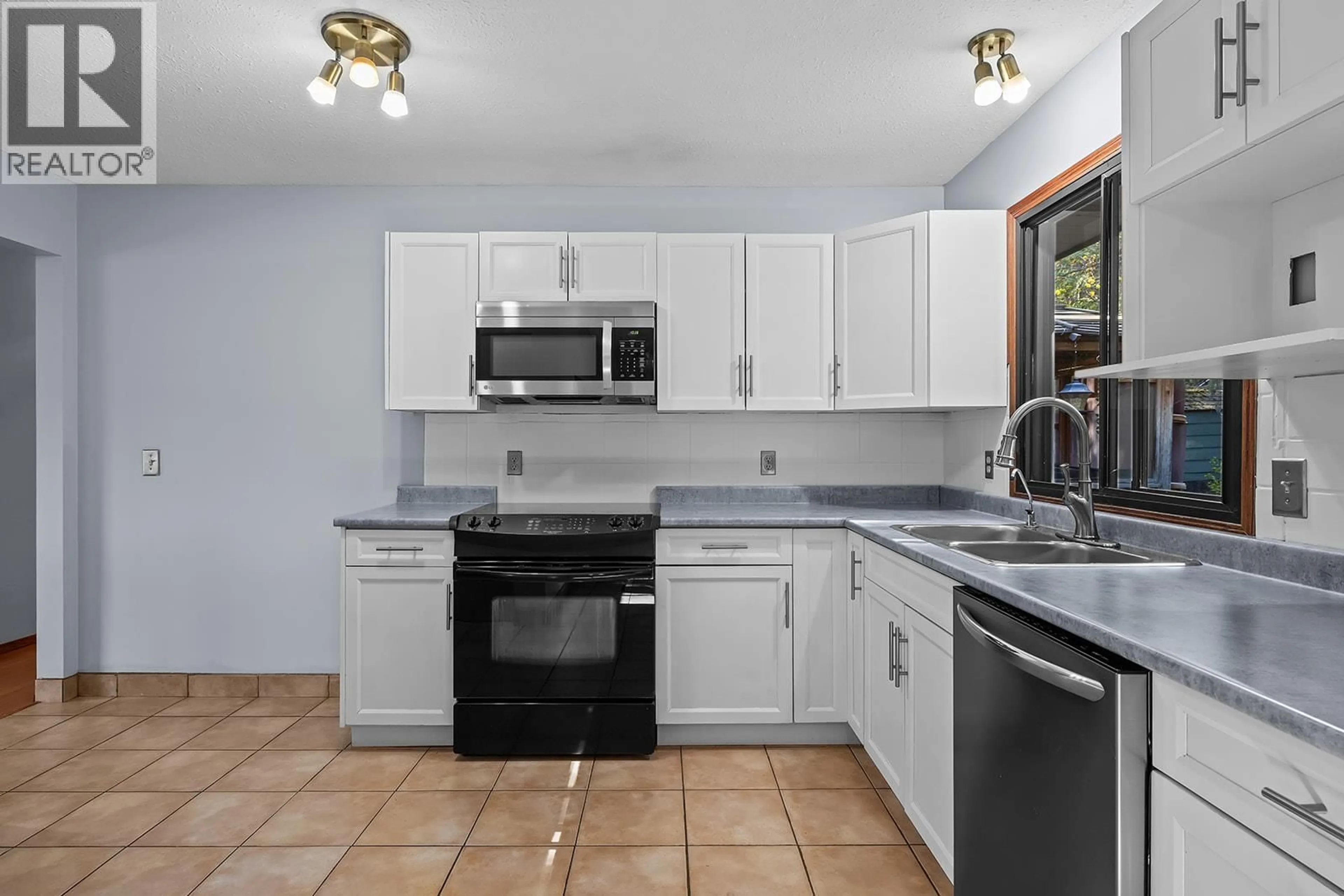 Standard kitchen, ceramic/tile floor for 2949 SANDSTONE CRESCENT, West Kelowna British Columbia V4T1T2
