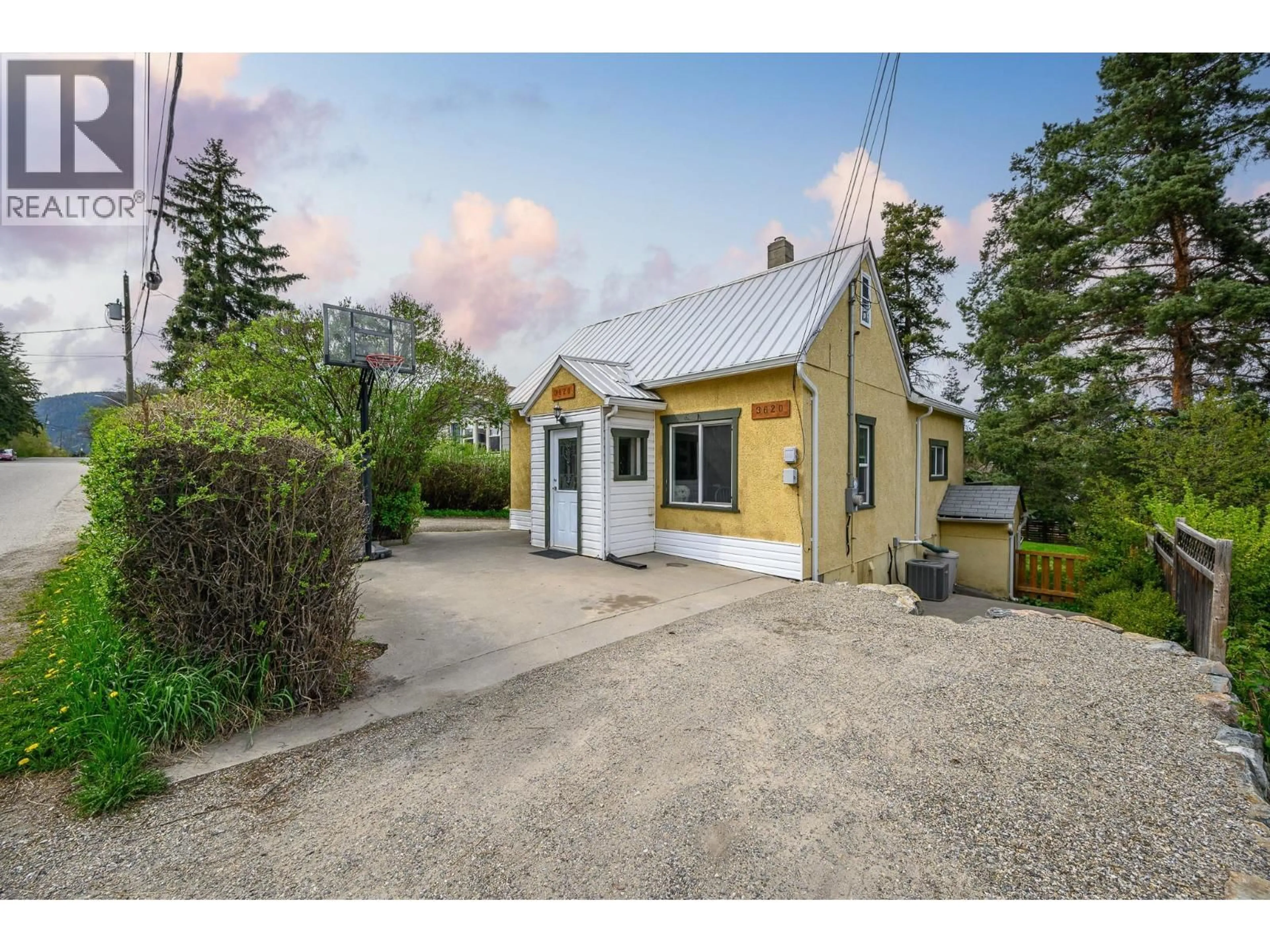 A pic from outside/outdoor area/front of a property/back of a property/a pic from drone, street for 3620 ROSEDALE AVENUE, Armstrong British Columbia V0E1B2