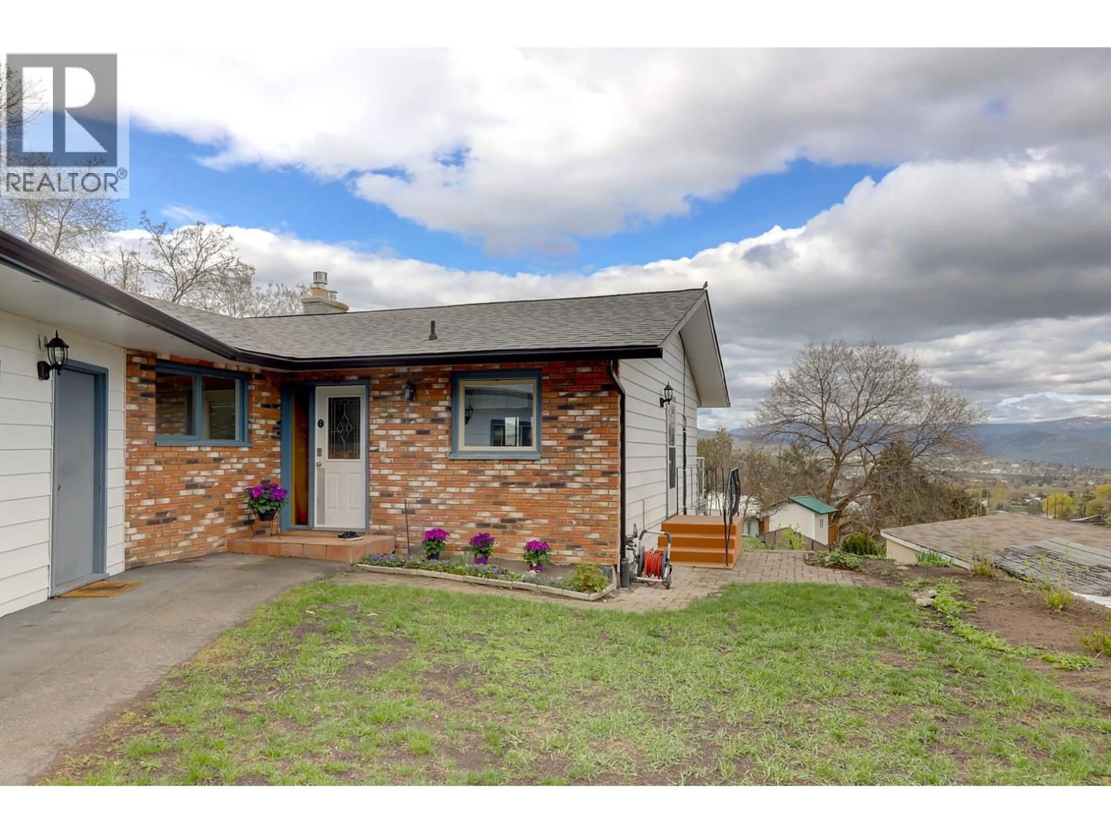 A pic from outside/outdoor area/front of a property/back of a property/a pic from drone, street for 674 PHEASANT ROAD, Vernon British Columbia V1B3B1