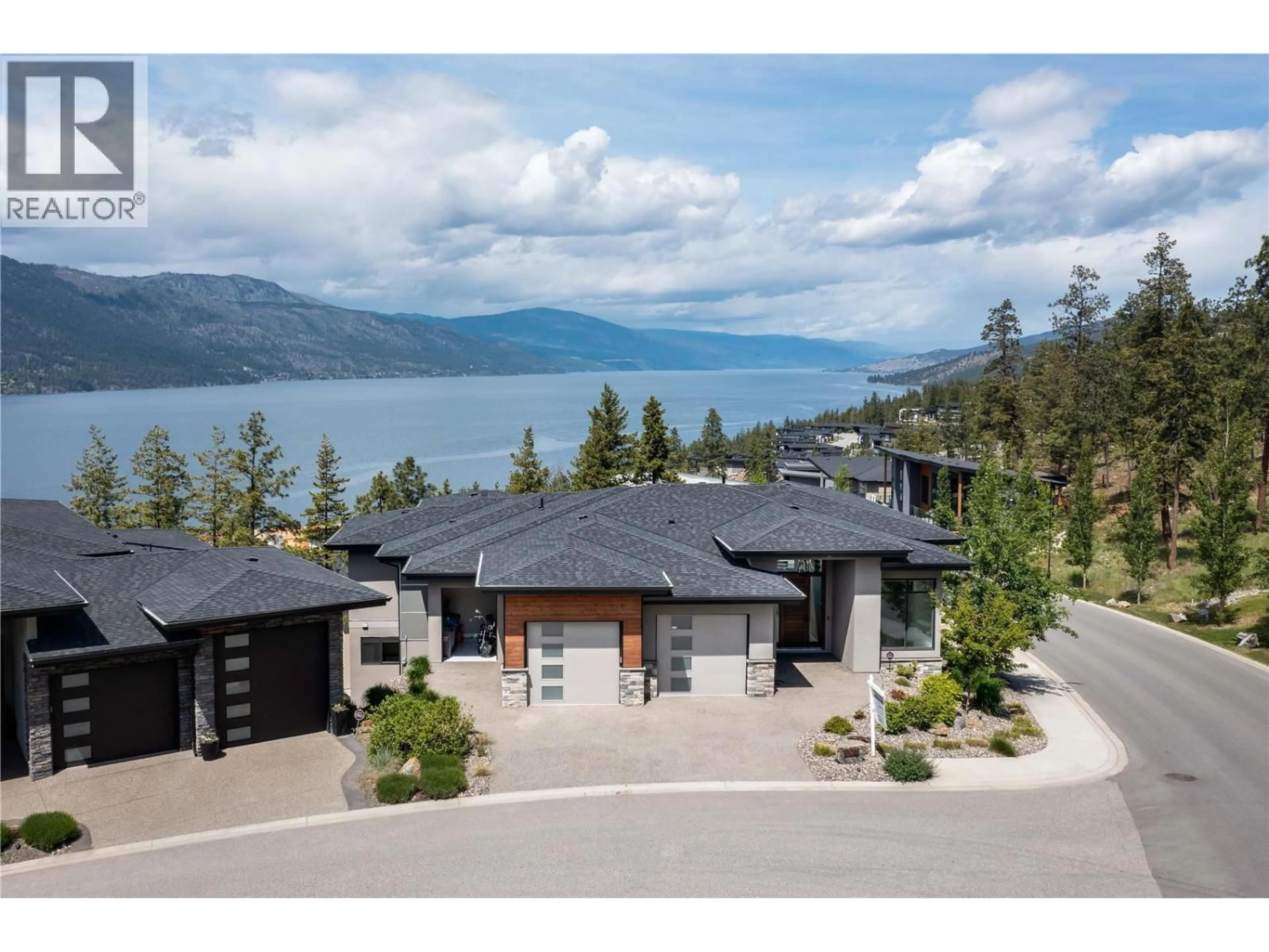 A pic from outside/outdoor area/front of a property/back of a property/a pic from drone, water/lake/river/ocean view for 3303 WATER BIRCH CIRCLE, Kelowna British Columbia V1V3G1