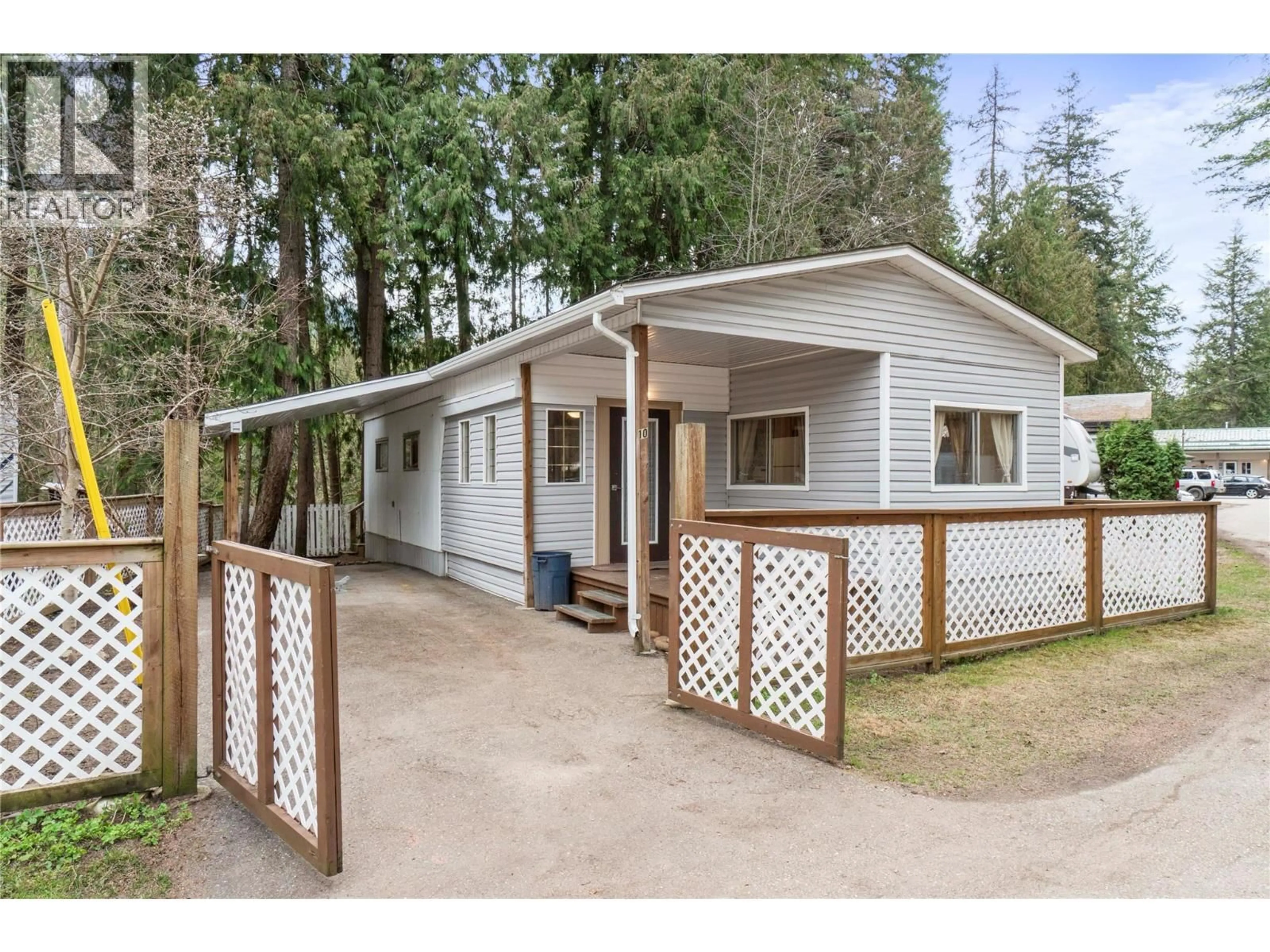Home with vinyl exterior material, street for 10 - 6670 TRANS CANADA HIGHWAY NORTHEAST, Canoe British Columbia V0E1K0