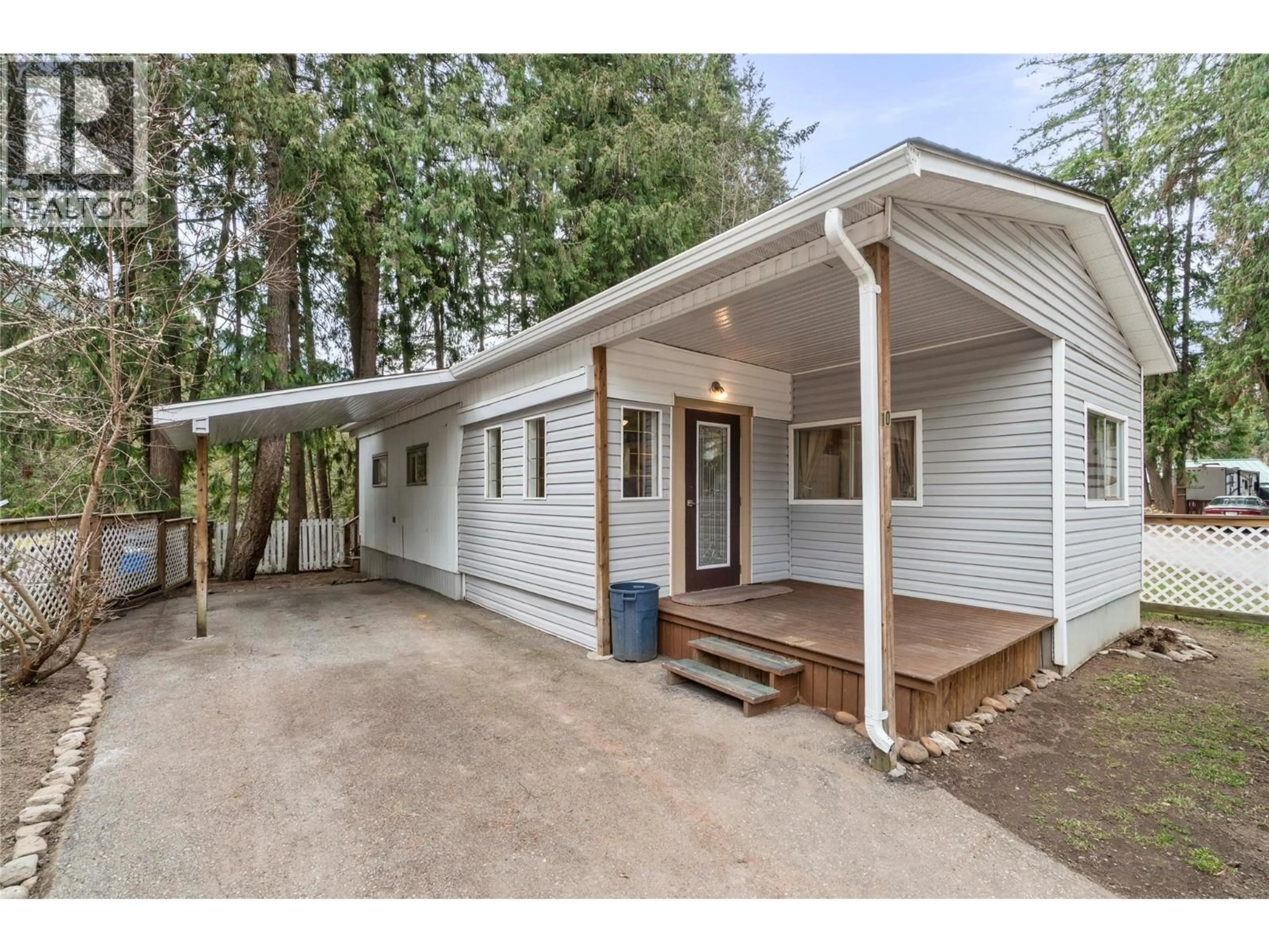 Home with vinyl exterior material, street for 10 - 6670 TRANS CANADA HIGHWAY NORTHEAST, Canoe British Columbia V0E1K0