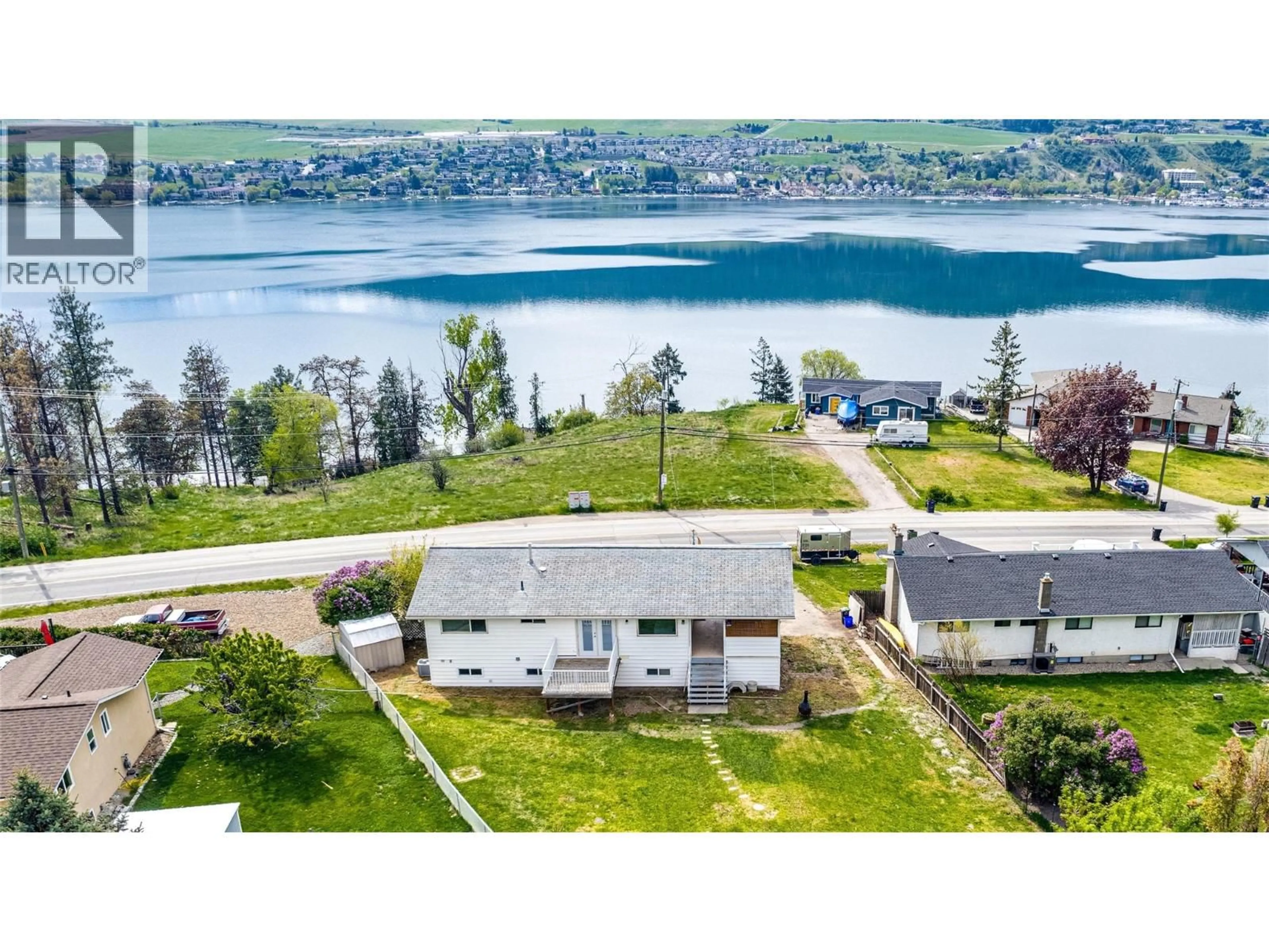 A pic from outside/outdoor area/front of a property/back of a property/a pic from drone, water/lake/river/ocean view for 7415 TRONSON ROAD, Vernon British Columbia V1H1S4