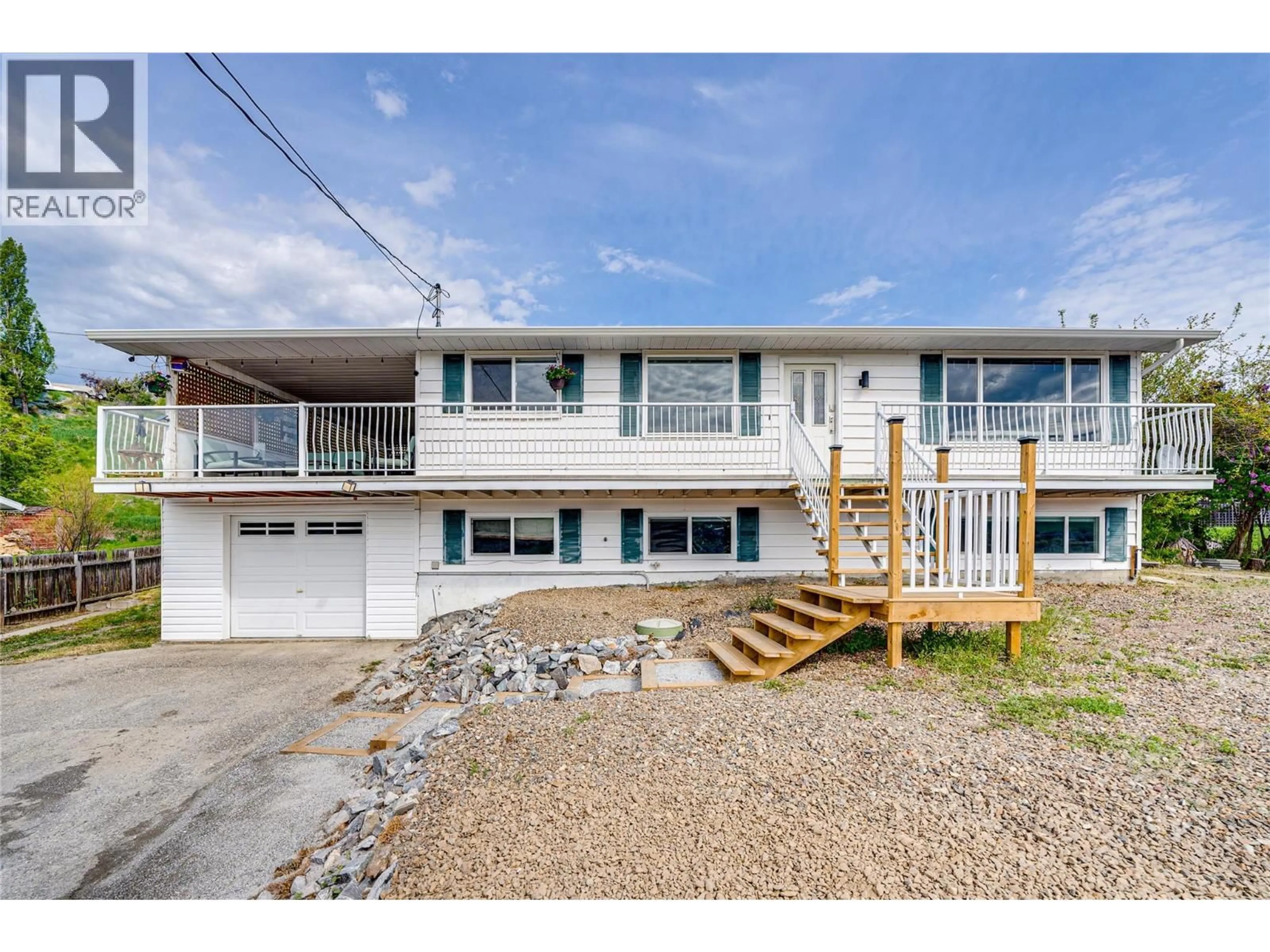 Home with vinyl exterior material, water/lake/river/ocean view for 7415 TRONSON ROAD, Vernon British Columbia V1H1S4