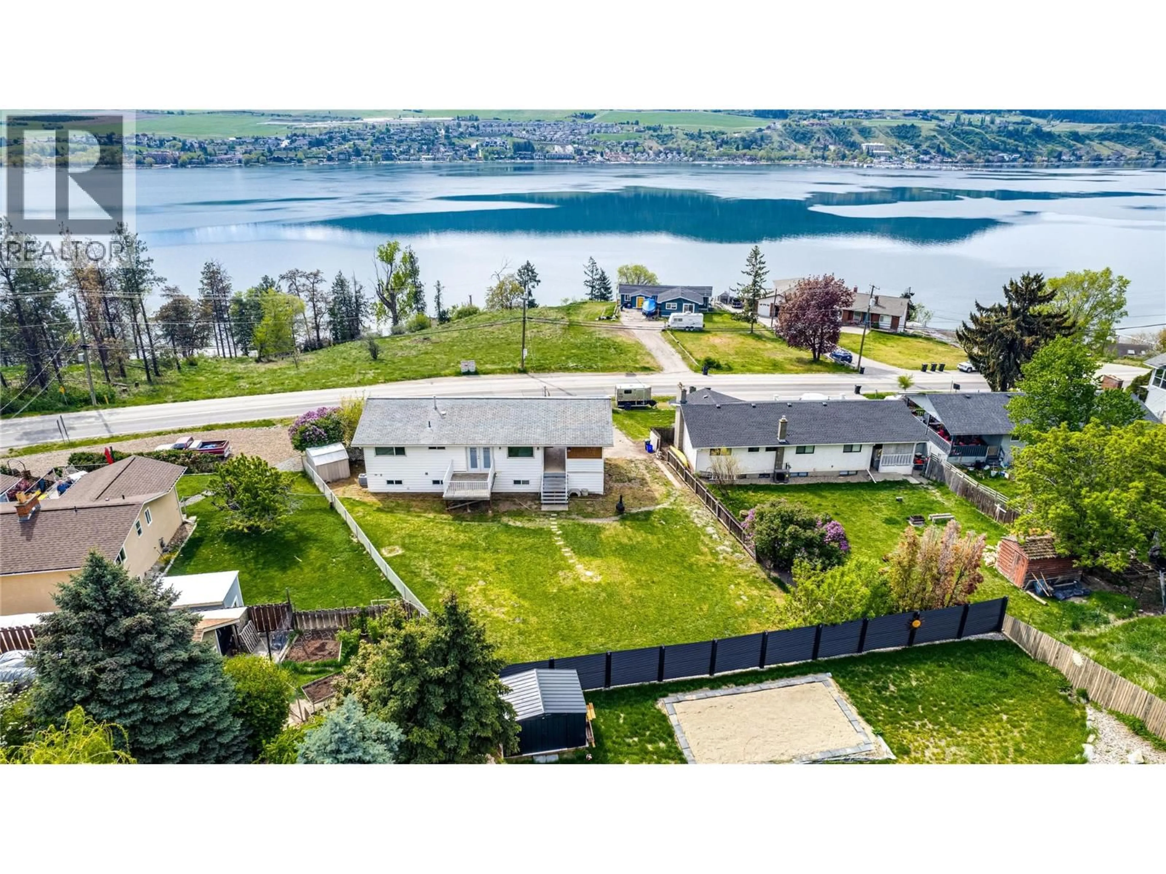A pic from outside/outdoor area/front of a property/back of a property/a pic from drone, water/lake/river/ocean view for 7415 TRONSON ROAD, Vernon British Columbia V1H1S4