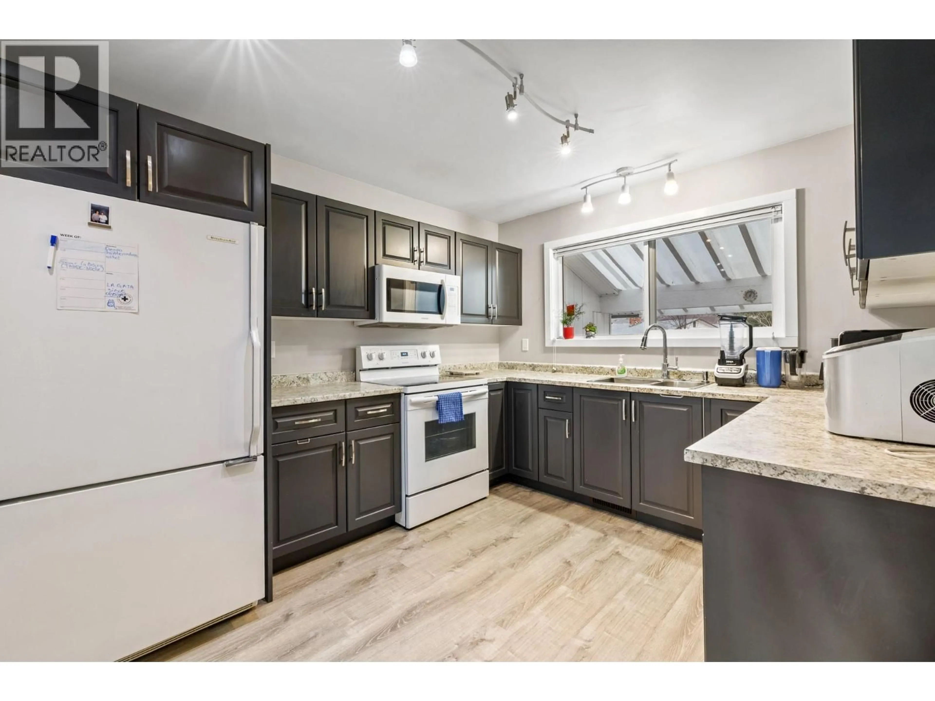 Open concept kitchen, unknown for 870 DOUGALL ROAD SOUTH, Kelowna British Columbia V1X3J8