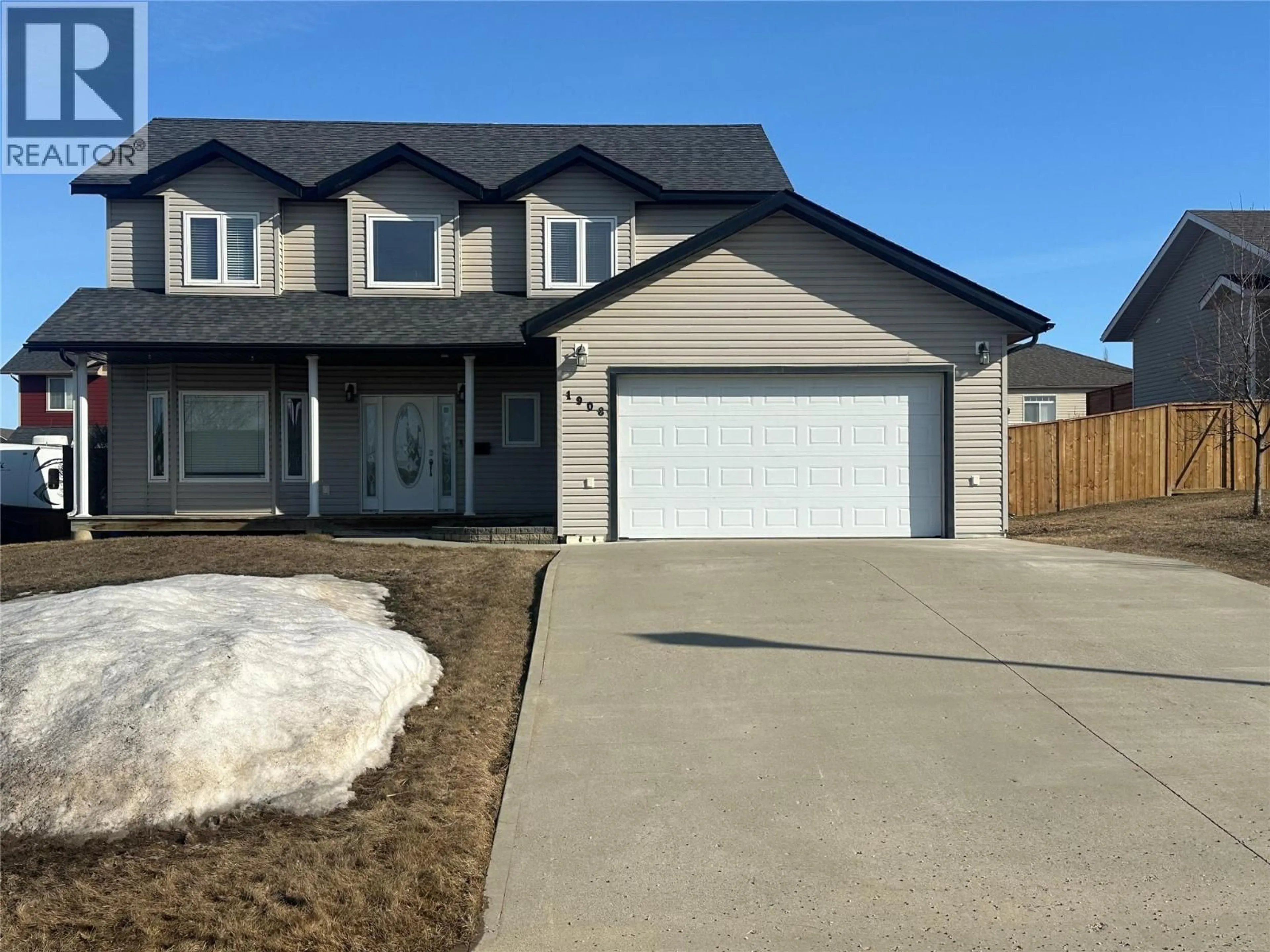 Home with vinyl exterior material, street for 1908 89 AVENUE, Dawson Creek British Columbia V1G0A1