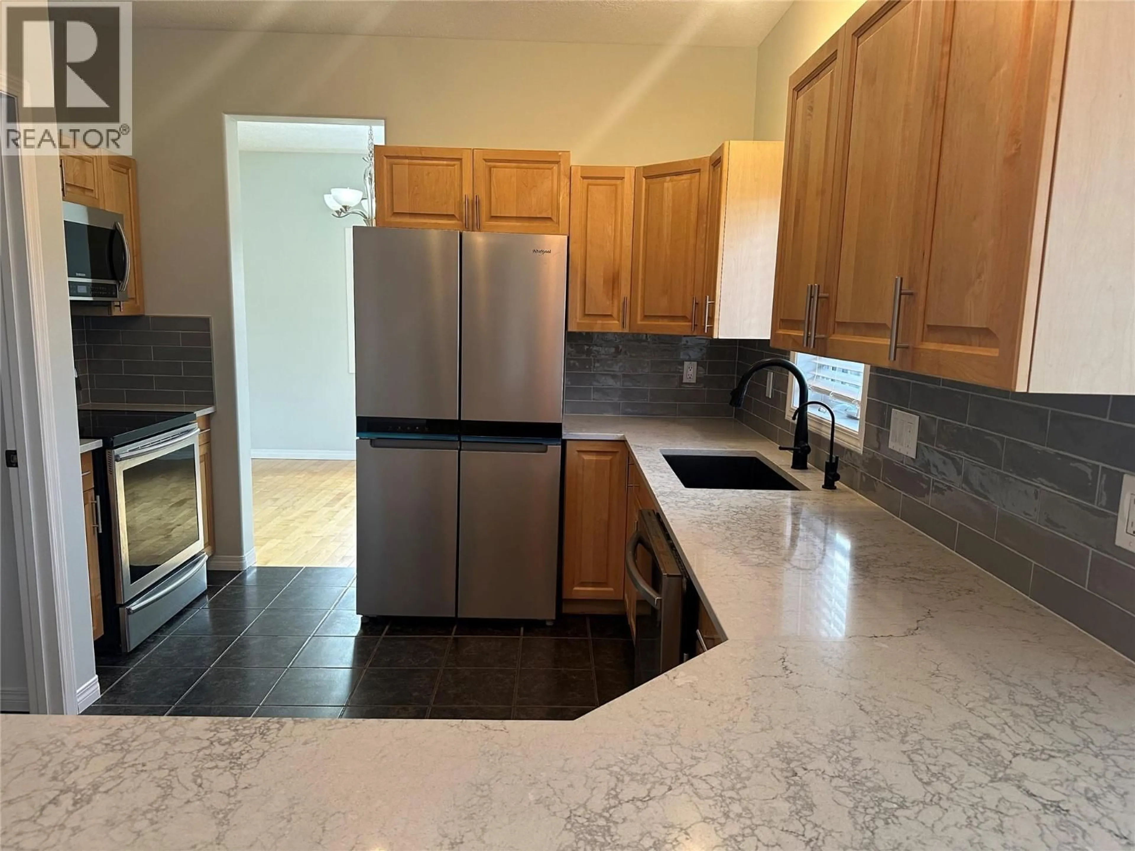 Open concept kitchen, unknown for 1908 89 AVENUE, Dawson Creek British Columbia V1G0A1