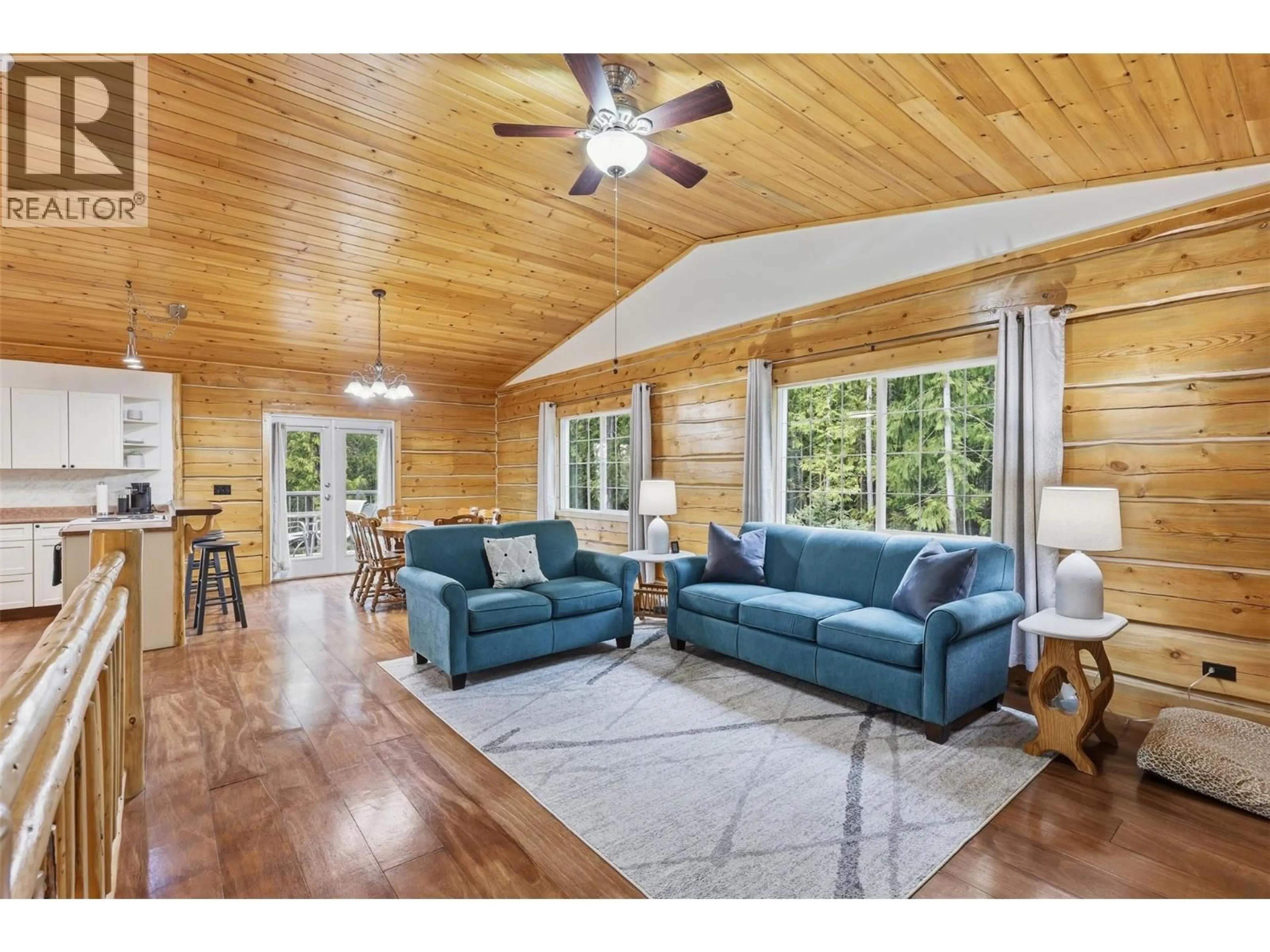 Living room with furniture, wood/laminate floor for 2233 WILDFLOWER LANE, Sorrento British Columbia V0E2W1