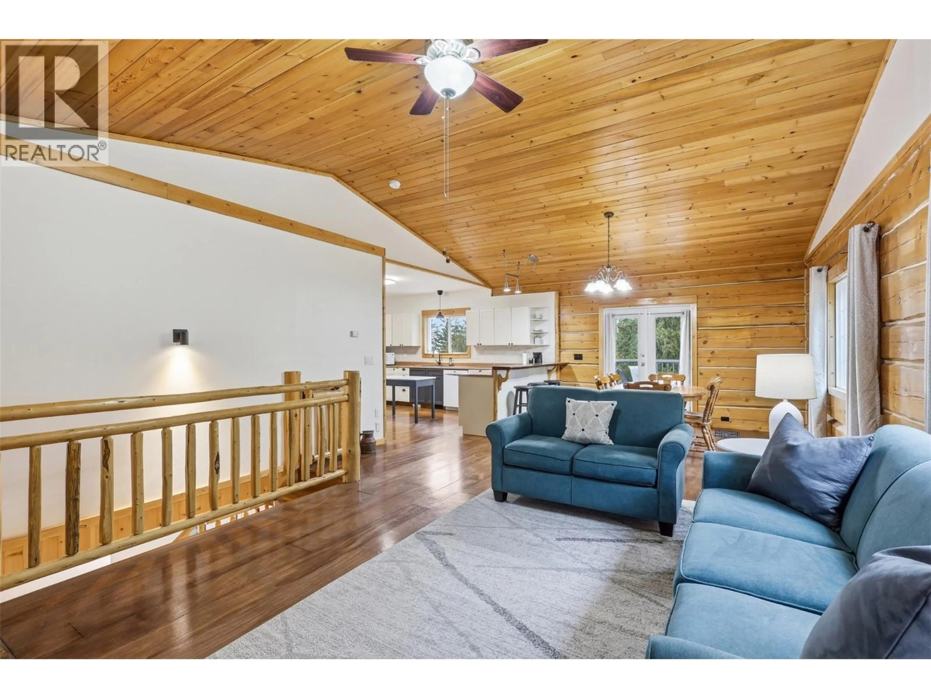 Living room with furniture, wood/laminate floor for 2233 WILDFLOWER LANE, Sorrento British Columbia V0E2W1