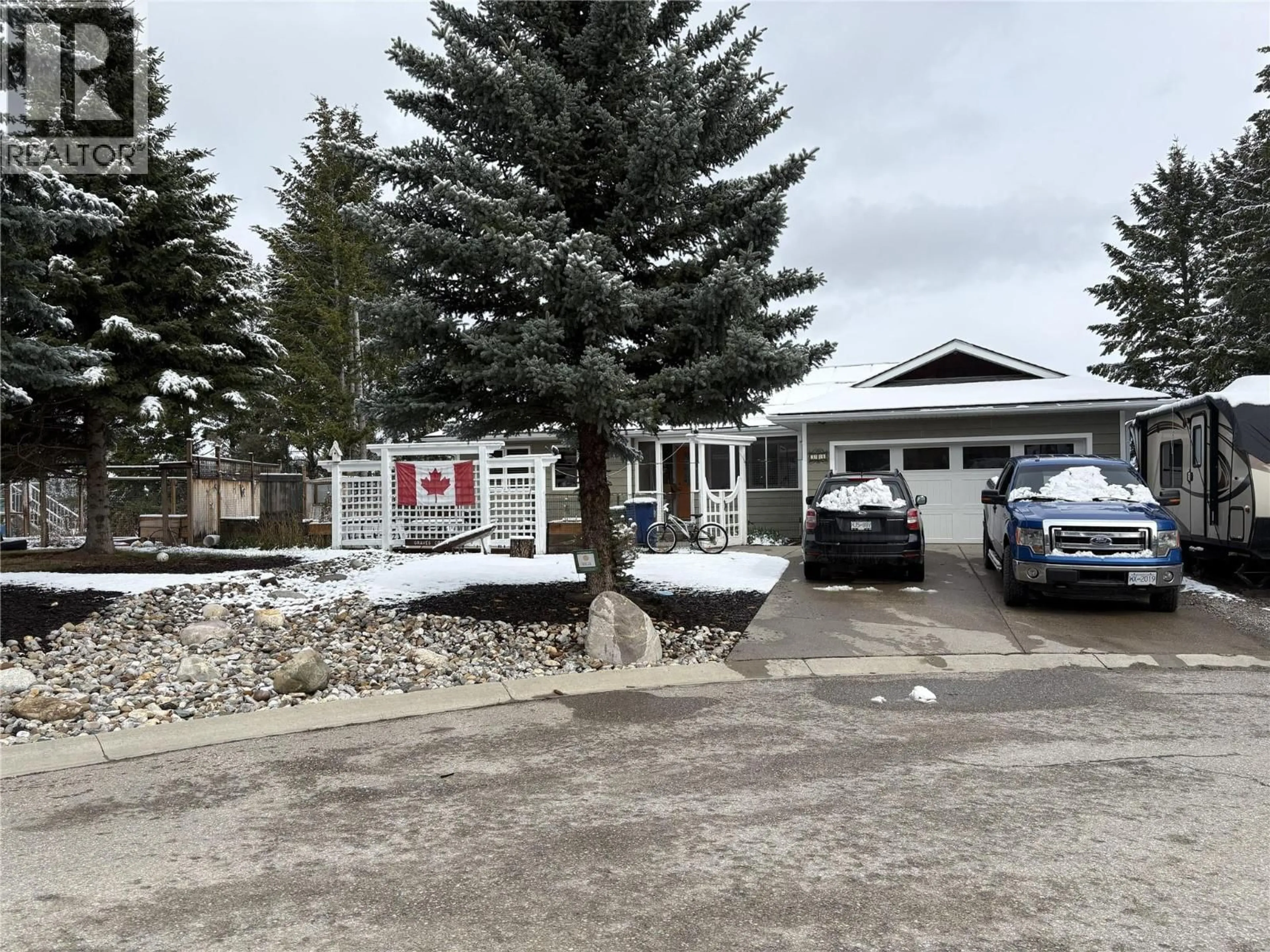 A pic from outside/outdoor area/front of a property/back of a property/a pic from drone, street for 304 WESTRIDGE PLACE, Invermere British Columbia V0A1K4
