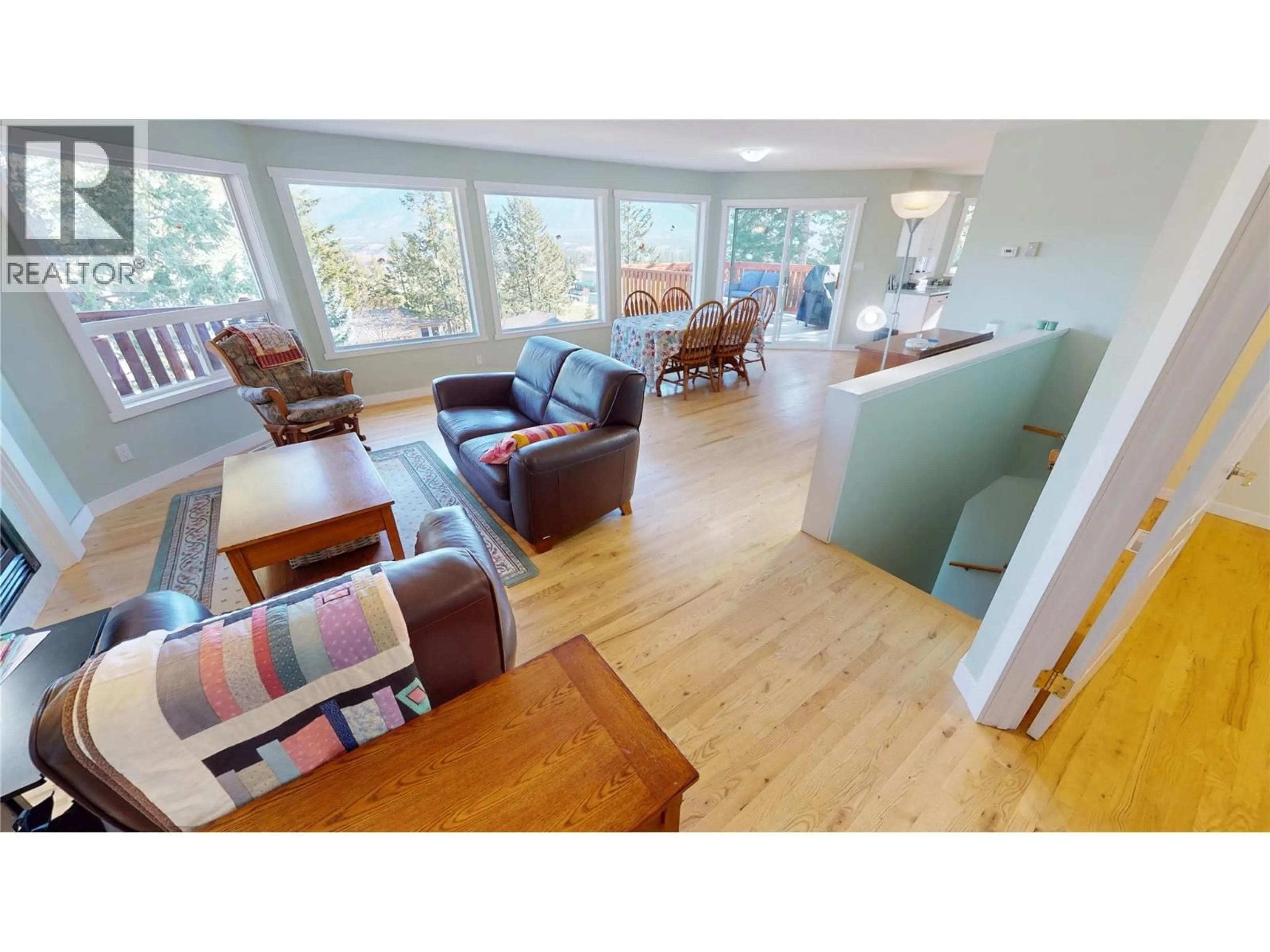 Living room with furniture, wood/laminate floor for 304 WESTRIDGE PLACE, Invermere British Columbia V0A1K4