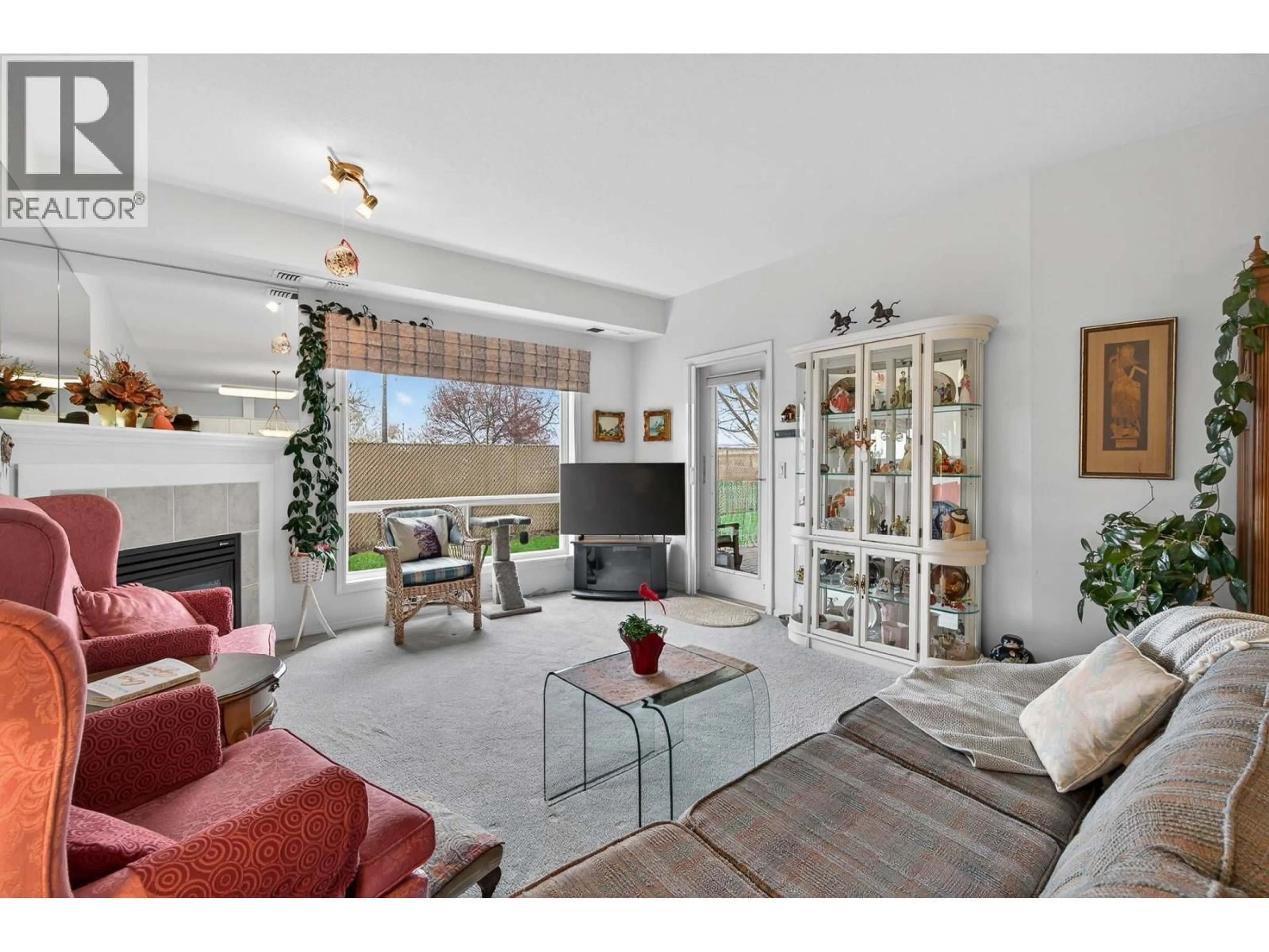 Living room with furniture, unknown for 105 - 2300 BENVOULIN ROAD, Kelowna British Columbia V1W2C6