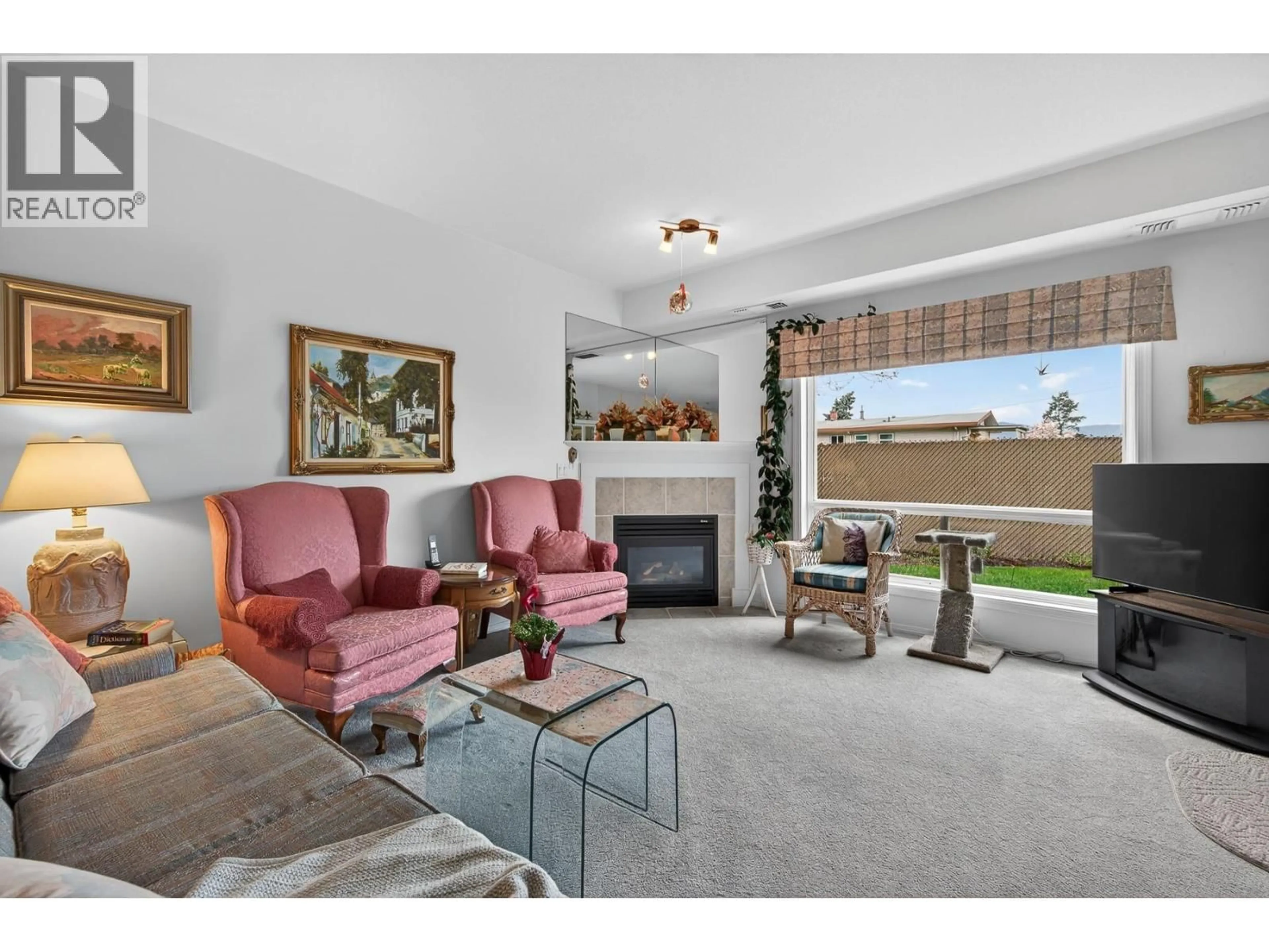 Living room with furniture, unknown for 105 - 2300 BENVOULIN ROAD, Kelowna British Columbia V1W2C6