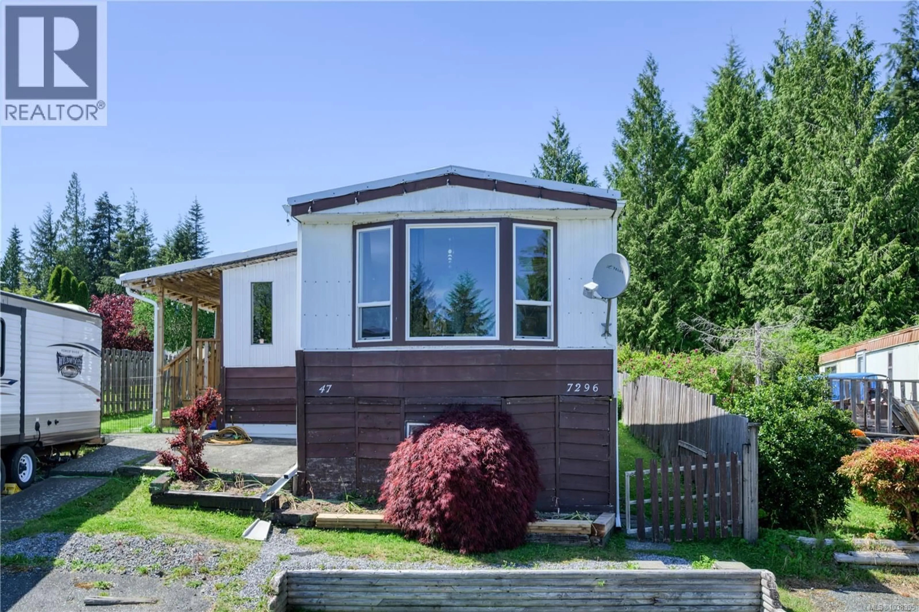 Home with vinyl exterior material, street for 7296 TEAKERNE DRIVE, Port Hardy British Columbia V0N2P0