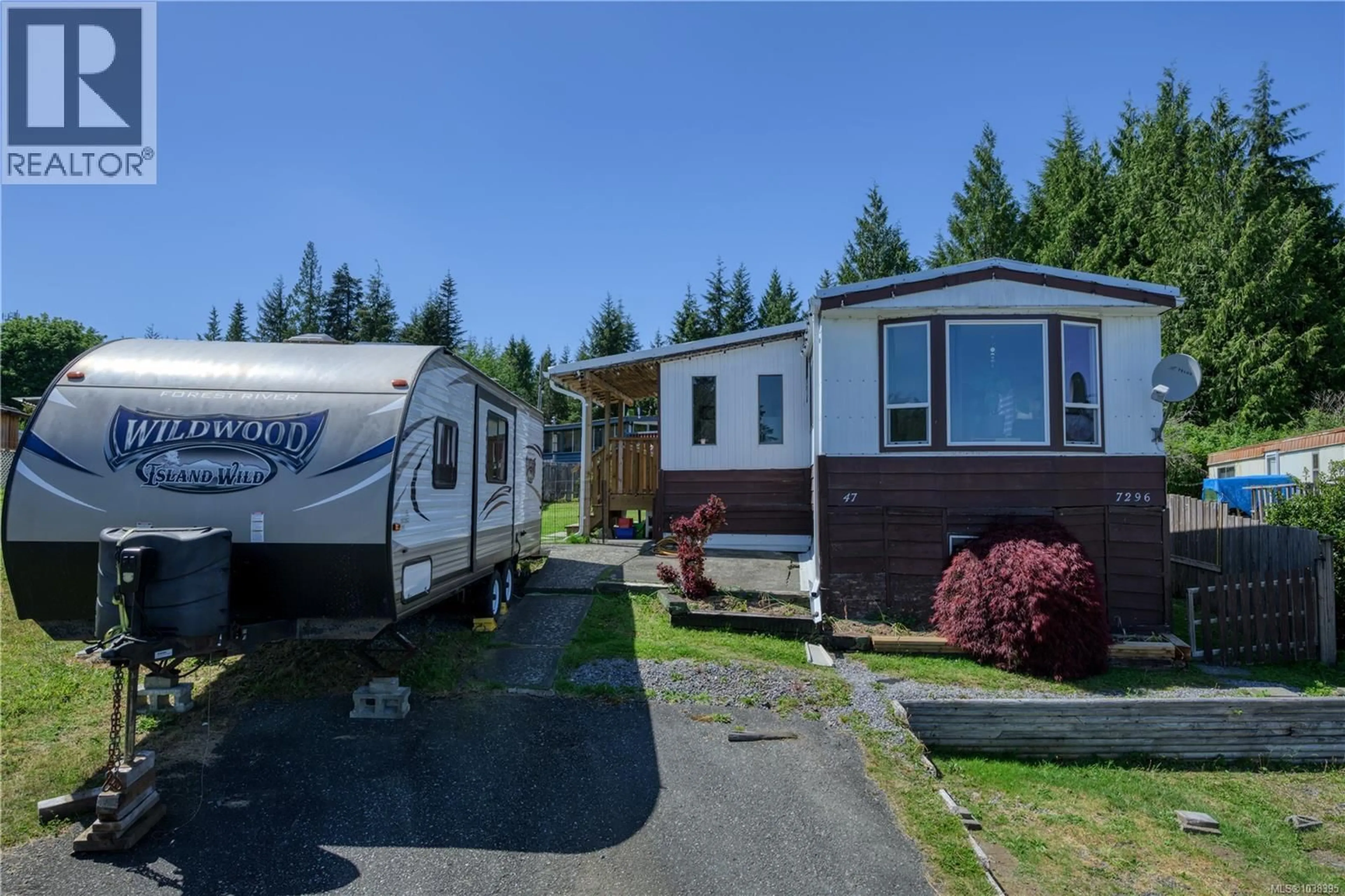 Home with vinyl exterior material, street for 7296 TEAKERNE DRIVE, Port Hardy British Columbia V0N2P0