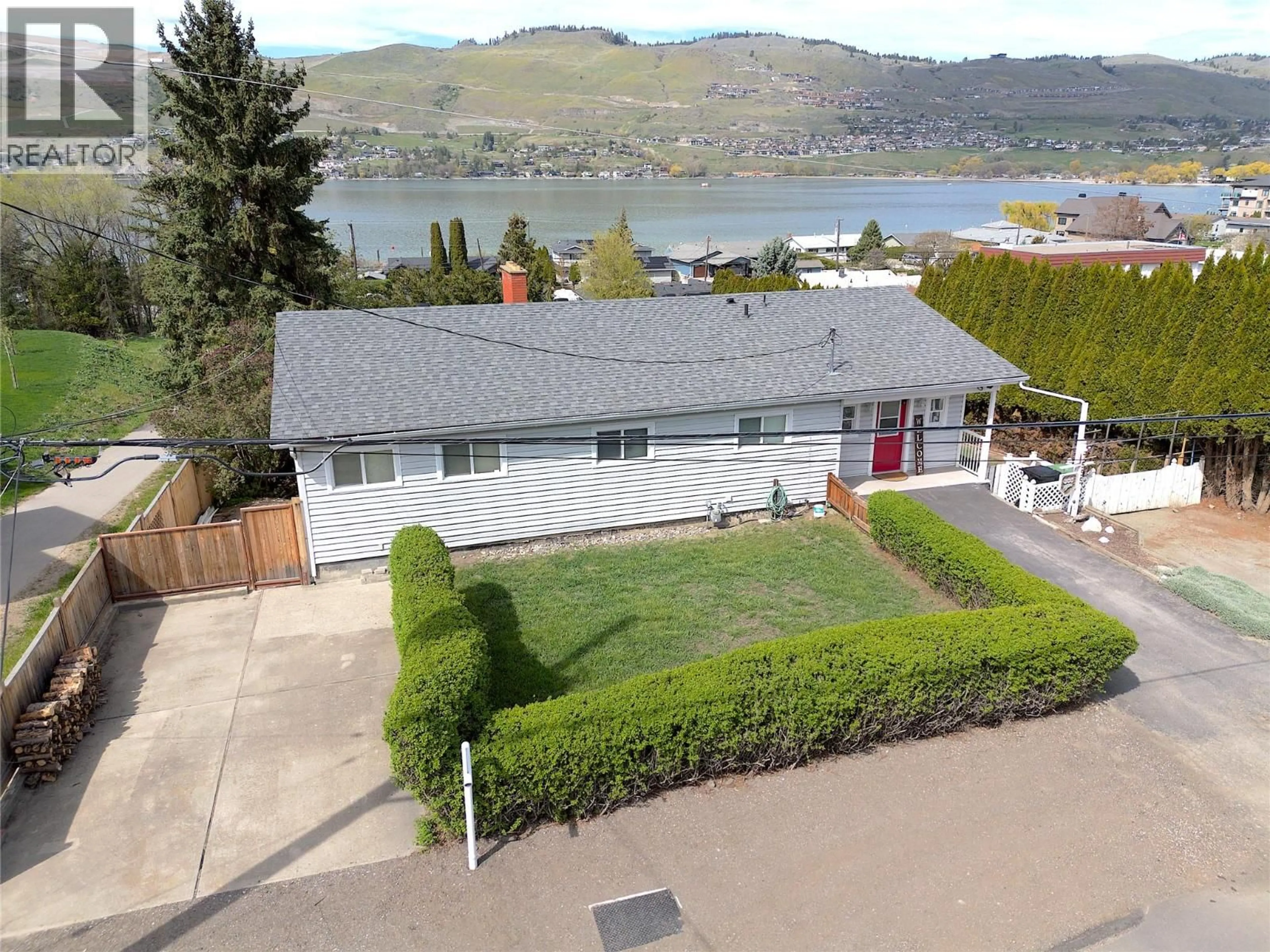 A pic from outside/outdoor area/front of a property/back of a property/a pic from drone, water/lake/river/ocean view for 7595 KLINGER ROAD, Vernon British Columbia V1H1H4