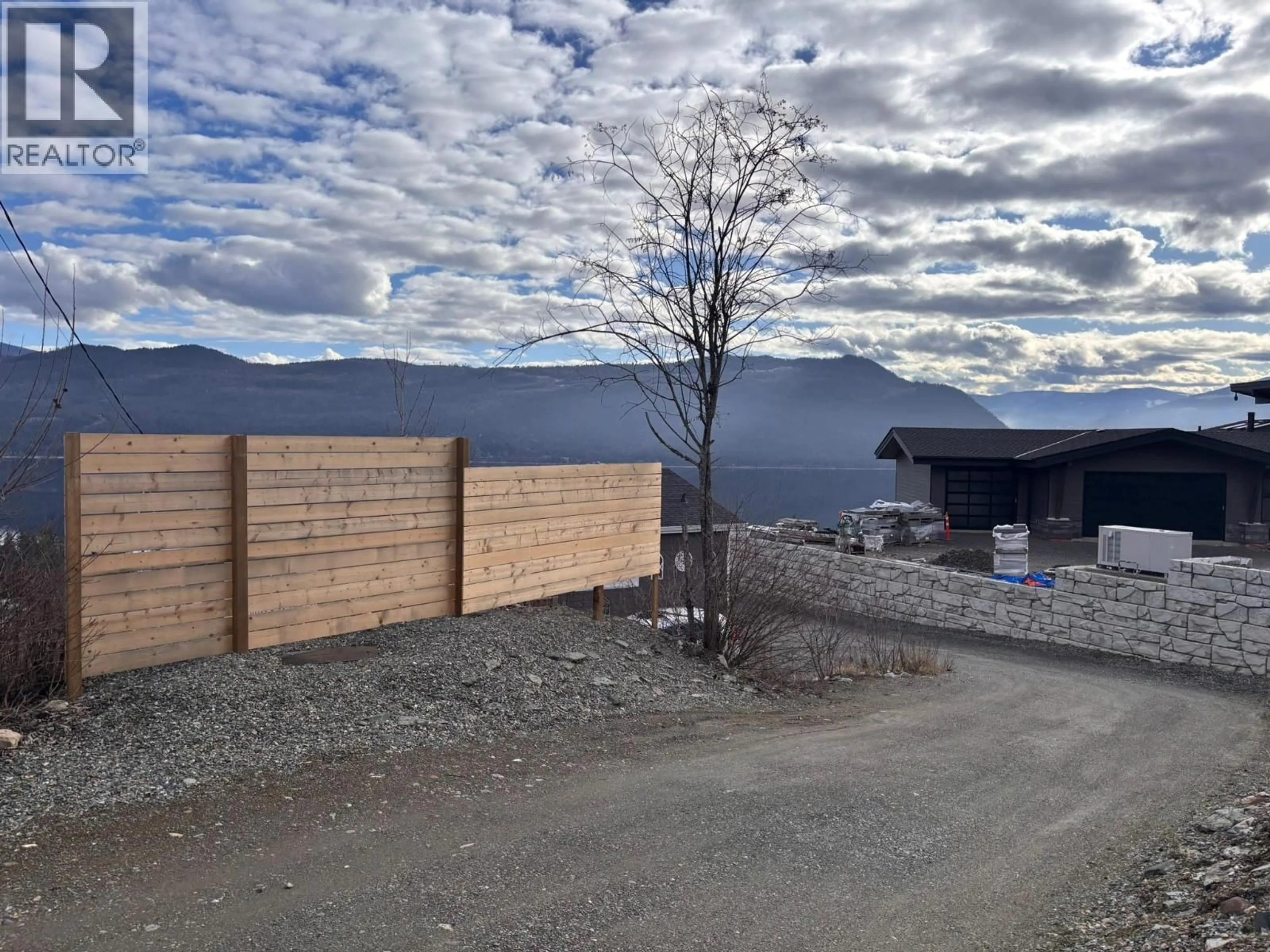 A pic from outside/outdoor area/front of a property/back of a property/a pic from drone, mountain view for 5208 CELISTA PLACE, Celista British Columbia V0E1M6