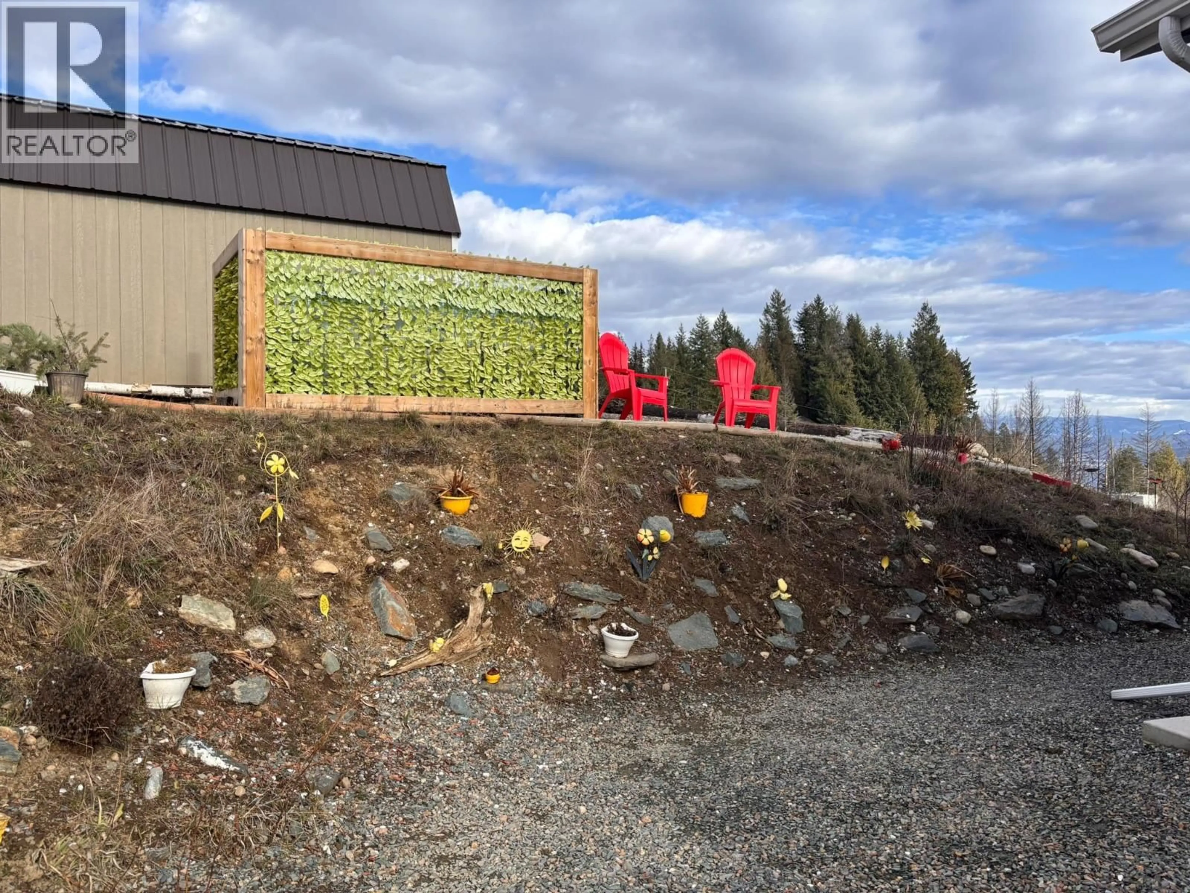 A pic from outside/outdoor area/front of a property/back of a property/a pic from drone, building for 5208 CELISTA PLACE, Celista British Columbia V0E1M6