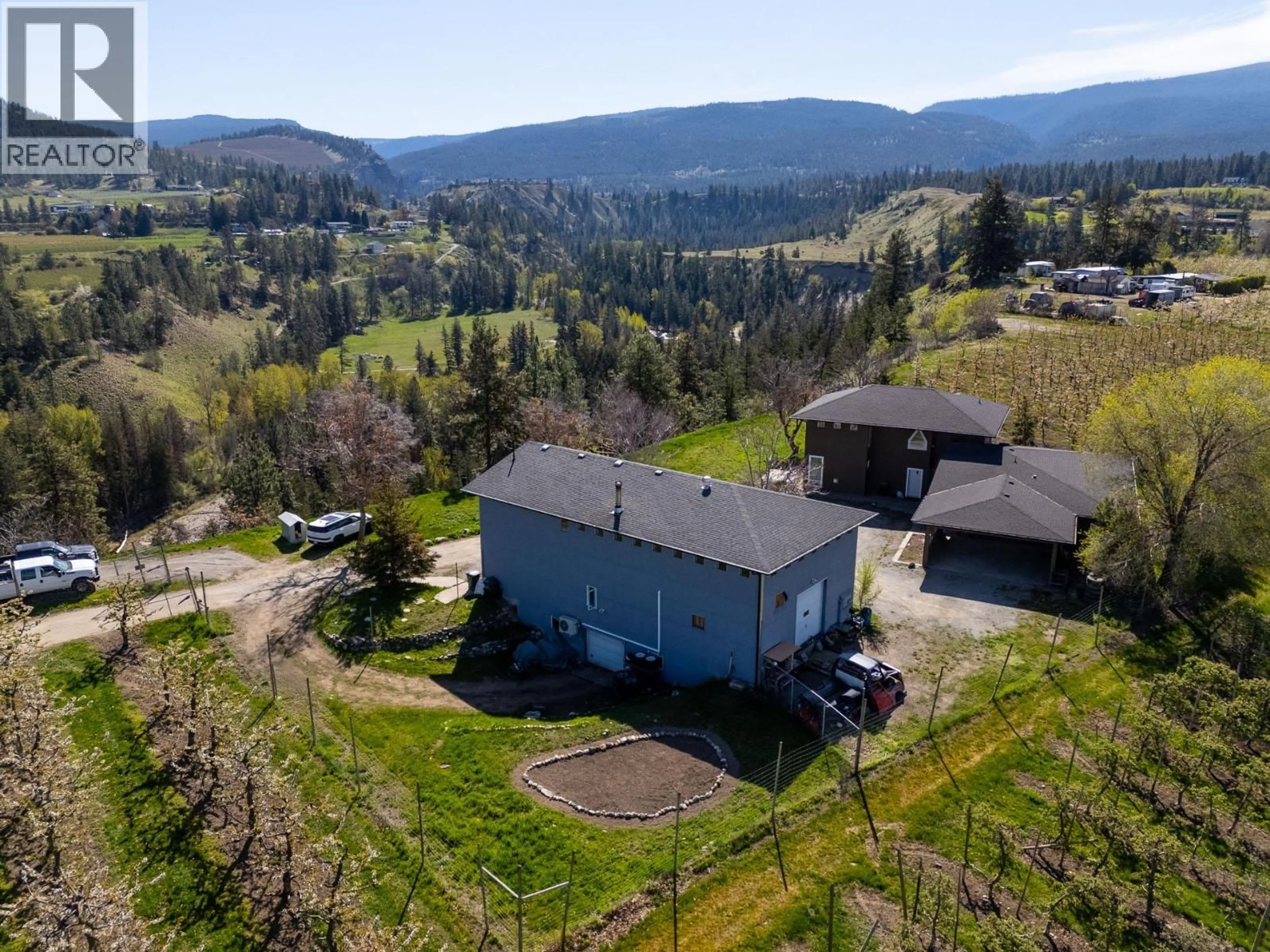 A pic from outside/outdoor area/front of a property/back of a property/a pic from drone, mountain view for 3547 BEMROSE ROAD, Kelowna British Columbia V1W4G8