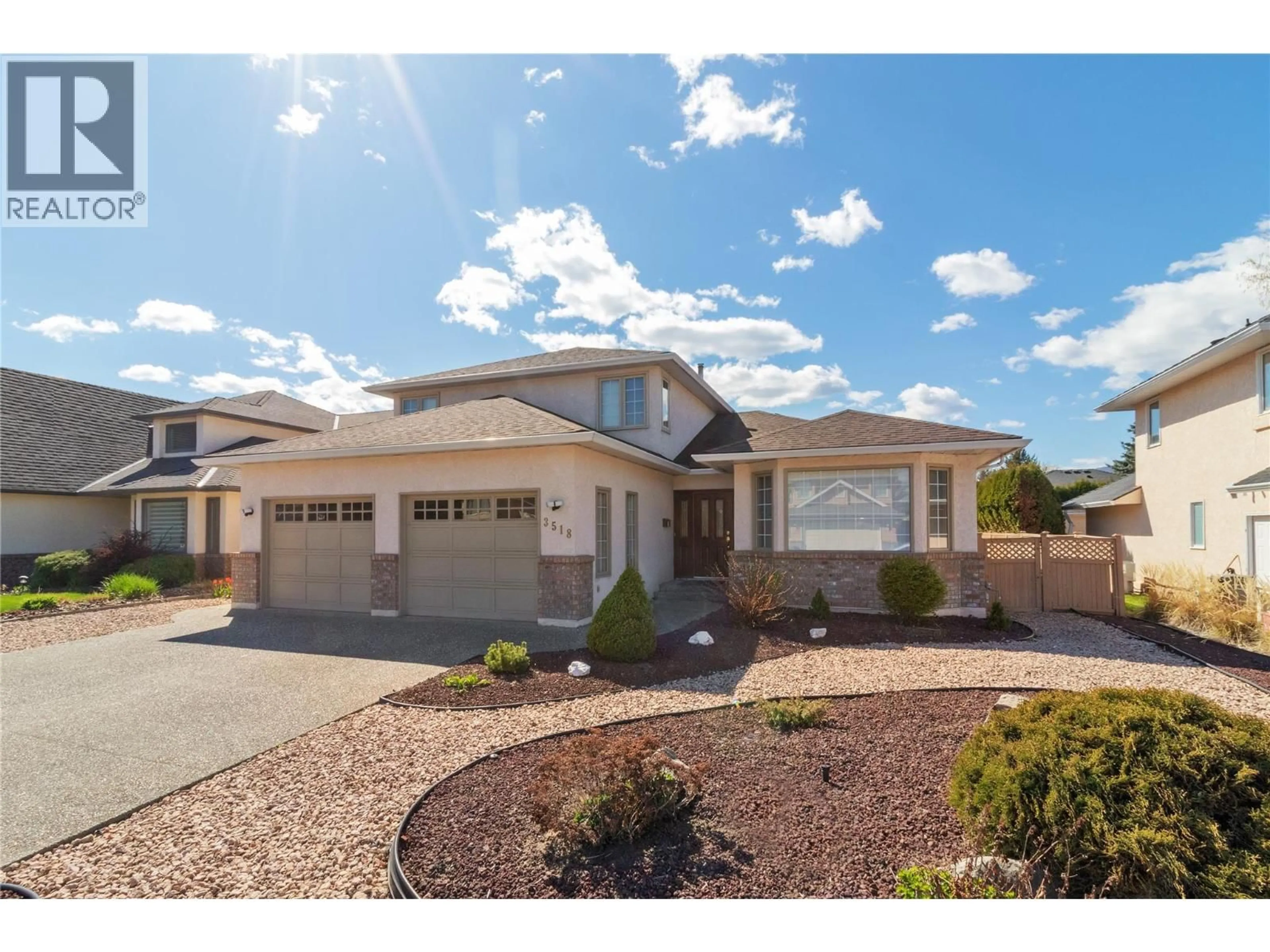 Home with vinyl exterior material, street for 3518 INVERMERE COURT, Kelowna British Columbia V1W3R5