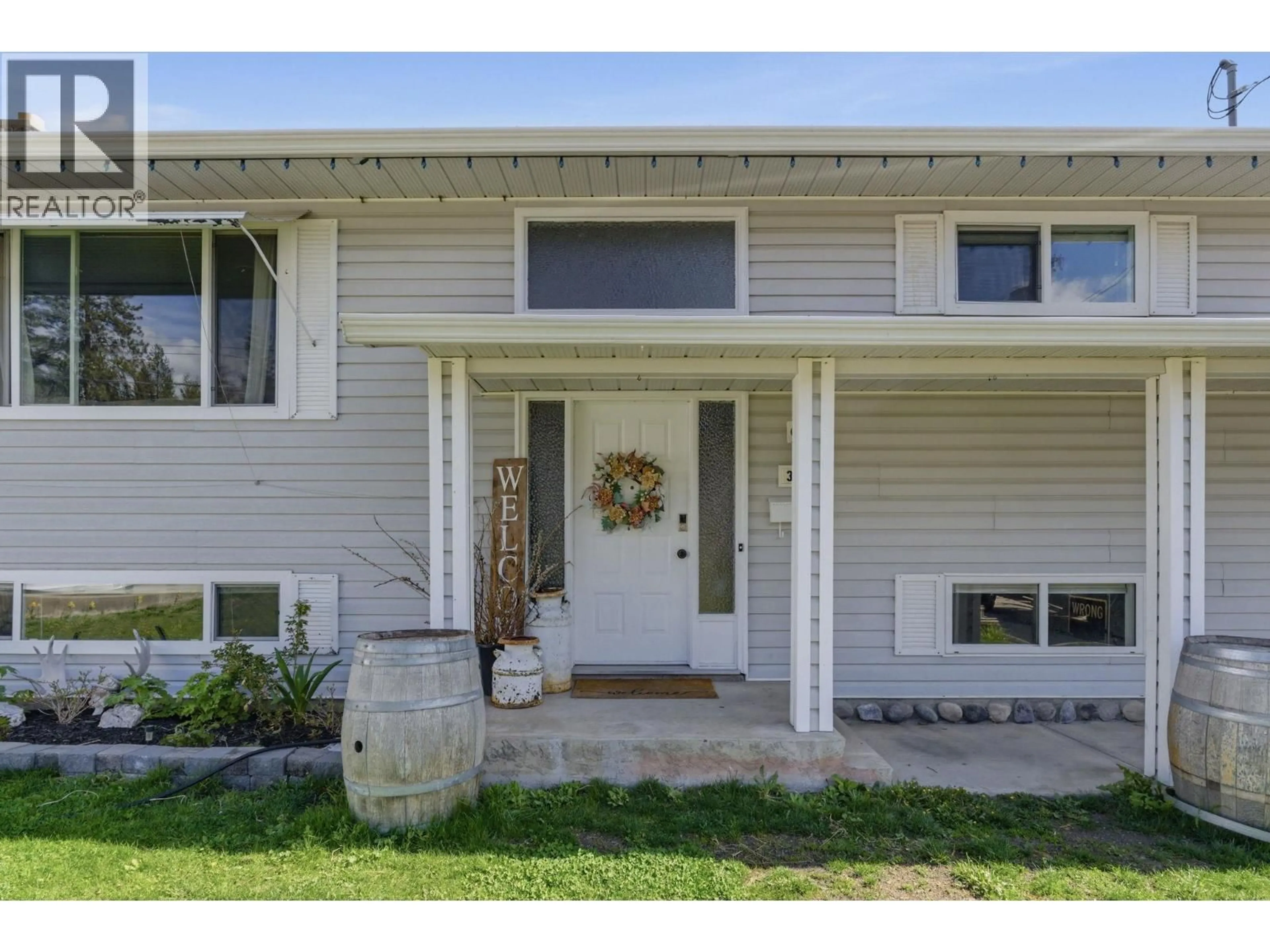 Home with vinyl exterior material, street for 3283 MCMAHON ROAD, West Kelowna British Columbia V4T1W6