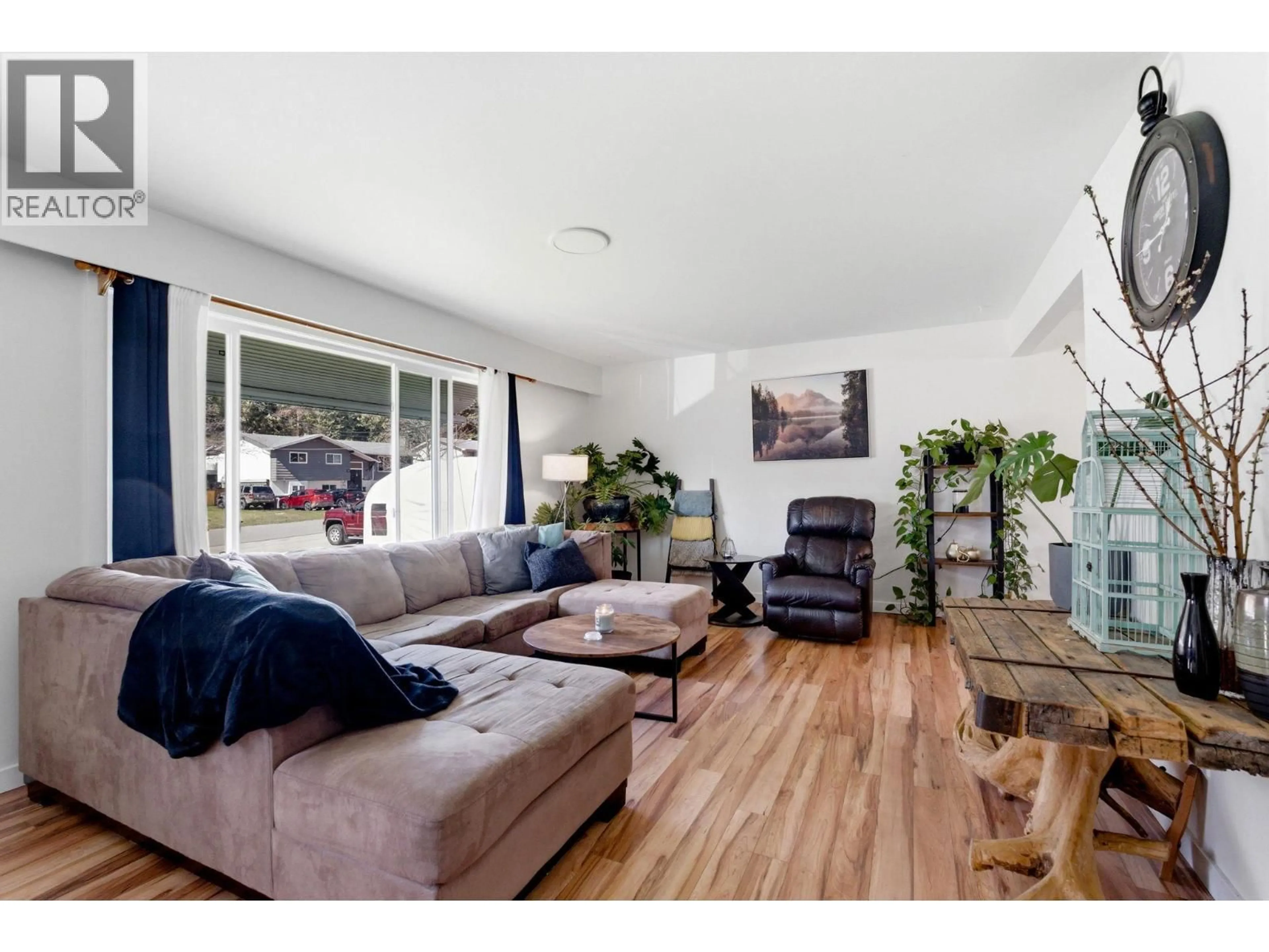 Living room with furniture, wood/laminate floor for 3283 MCMAHON ROAD, West Kelowna British Columbia V4T1W6