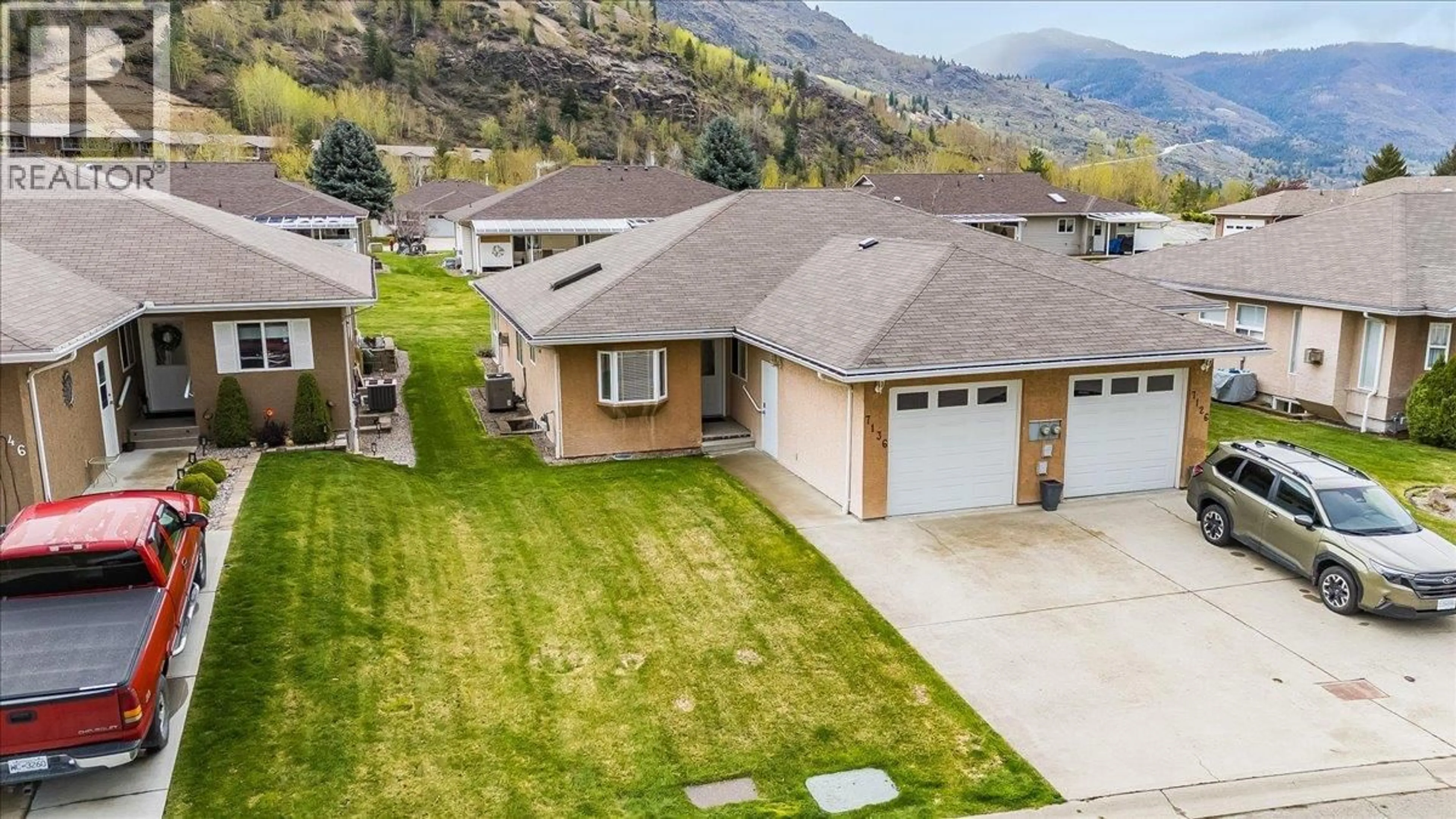A pic from outside/outdoor area/front of a property/back of a property/a pic from drone, mountain view for 7136 WRIGHT WAY, Trail British Columbia V1R4X6