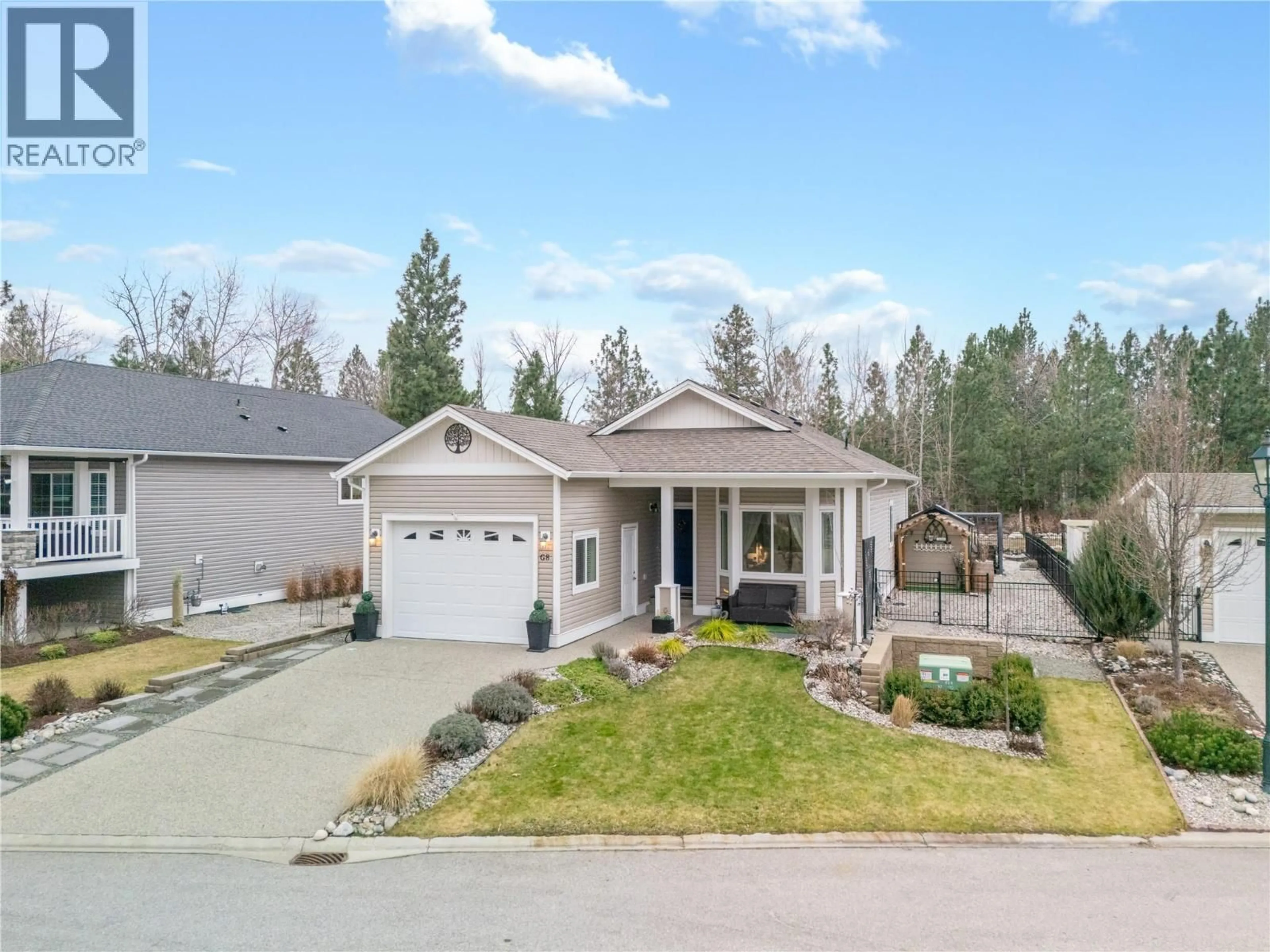 Home with vinyl exterior material, street for G8 - 4505 MCLEAN CREEK ROAD, Okanagan Falls British Columbia V0H1R1