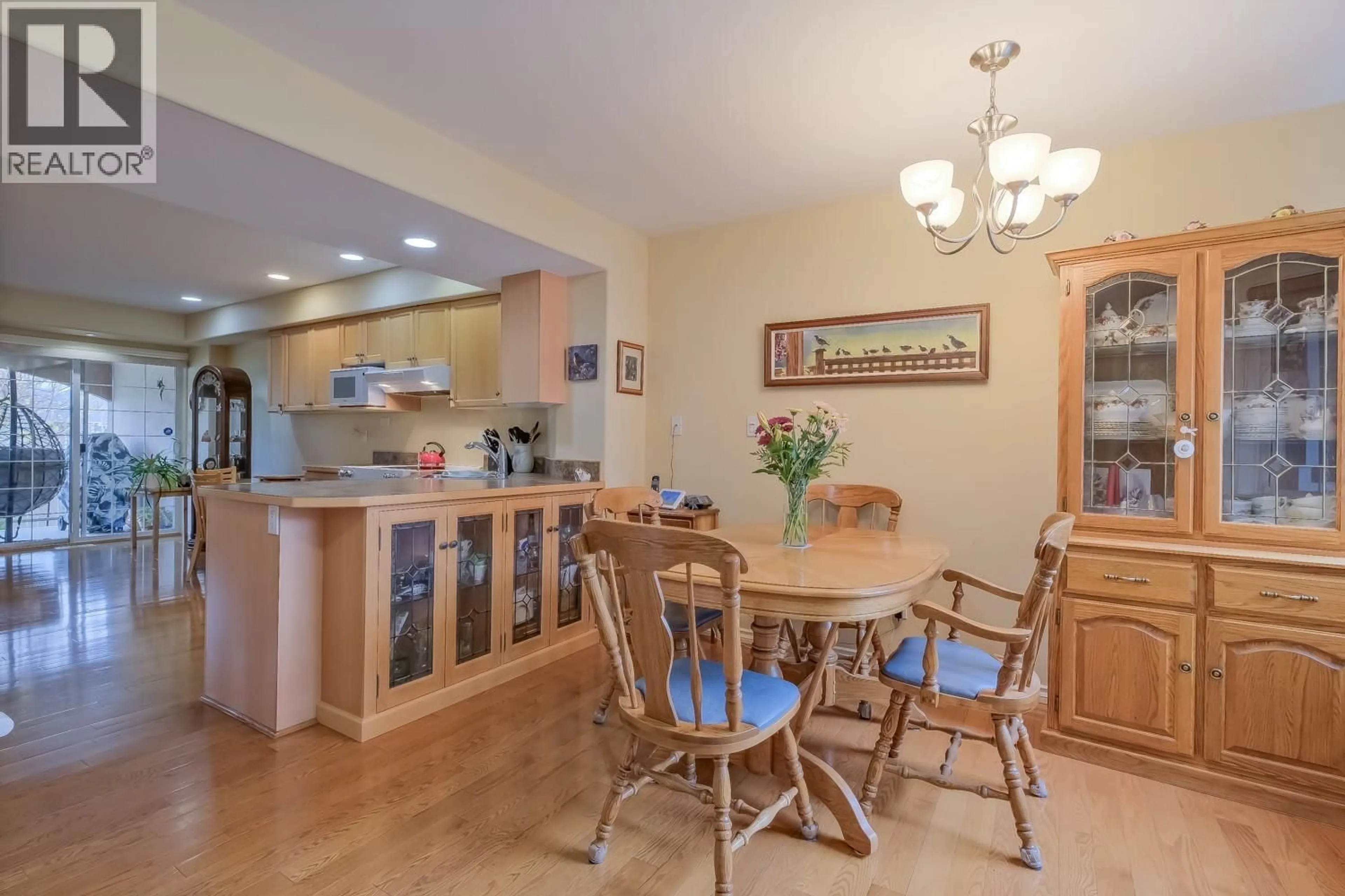 Dining room, wood/laminate floor for 110 - 705 BALSAM AVENUE, Penticton British Columbia V2A9B7