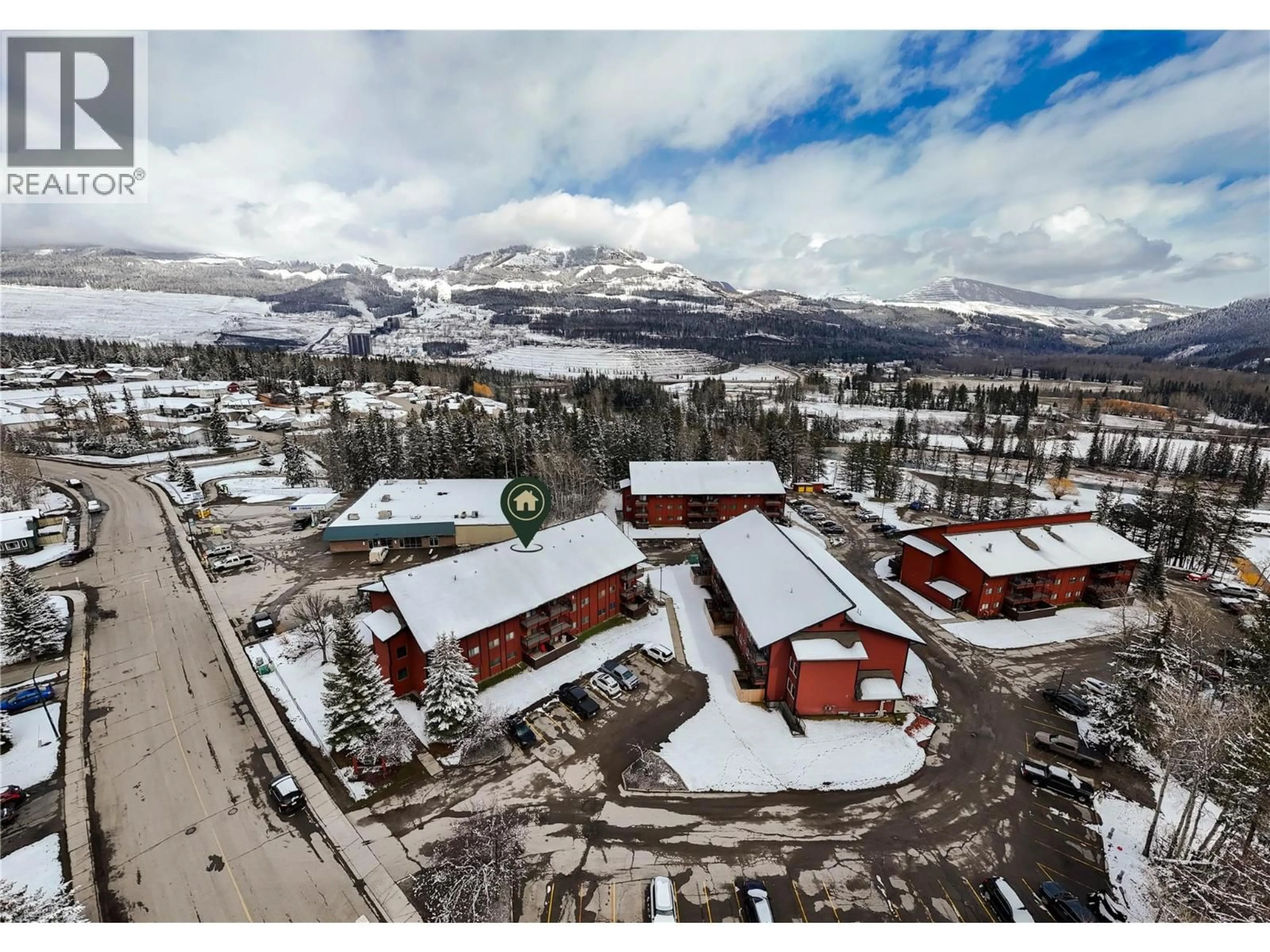 A pic from outside/outdoor area/front of a property/back of a property/a pic from drone, mountain view for 114A - 1286 PONDEROSA DRIVE, Sparwood British Columbia V0B2G2