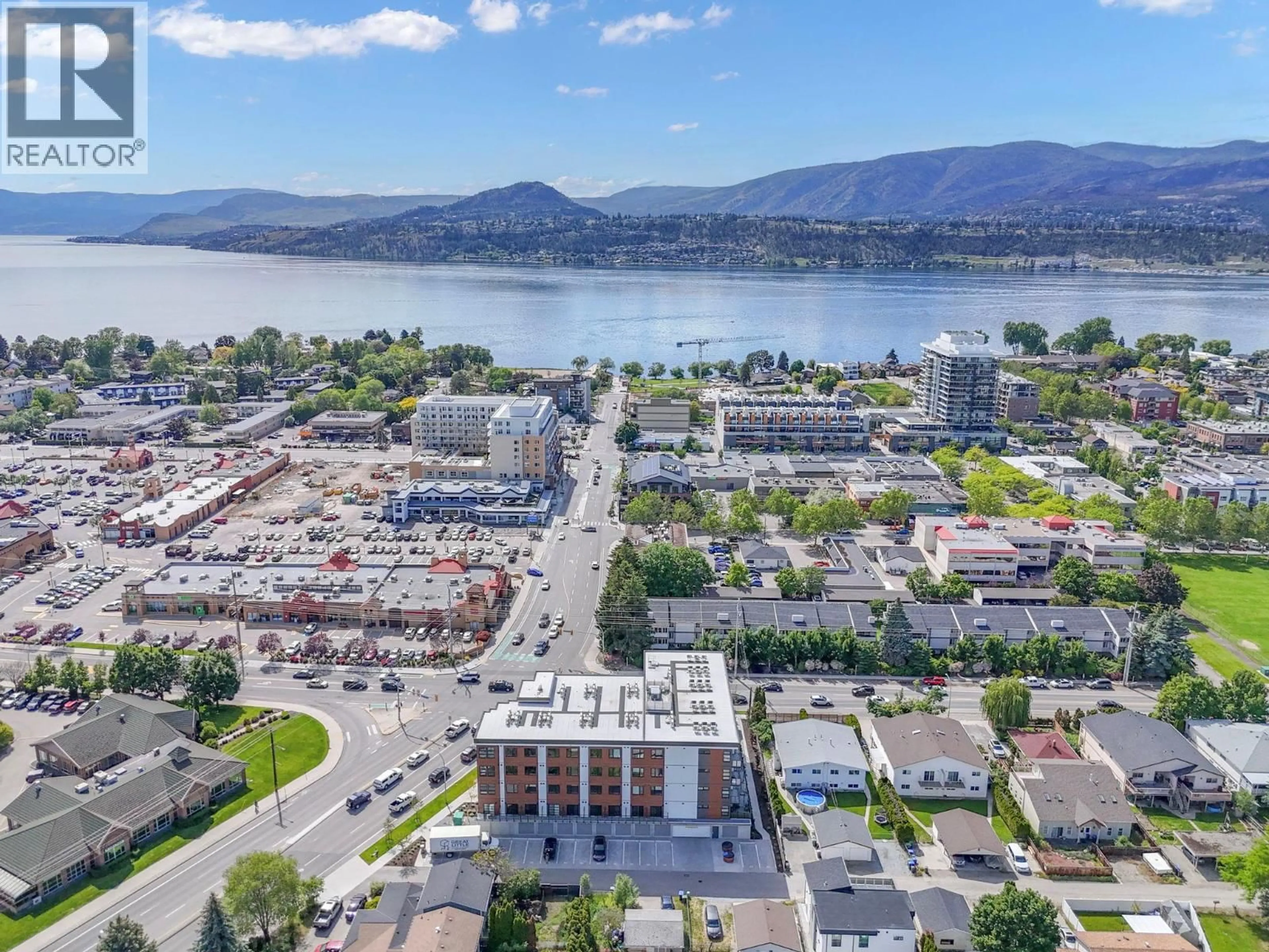 A pic from outside/outdoor area/front of a property/back of a property/a pic from drone, water/lake/river/ocean view for 418 - 720 KLO ROAD, Kelowna British Columbia V1Y4X5
