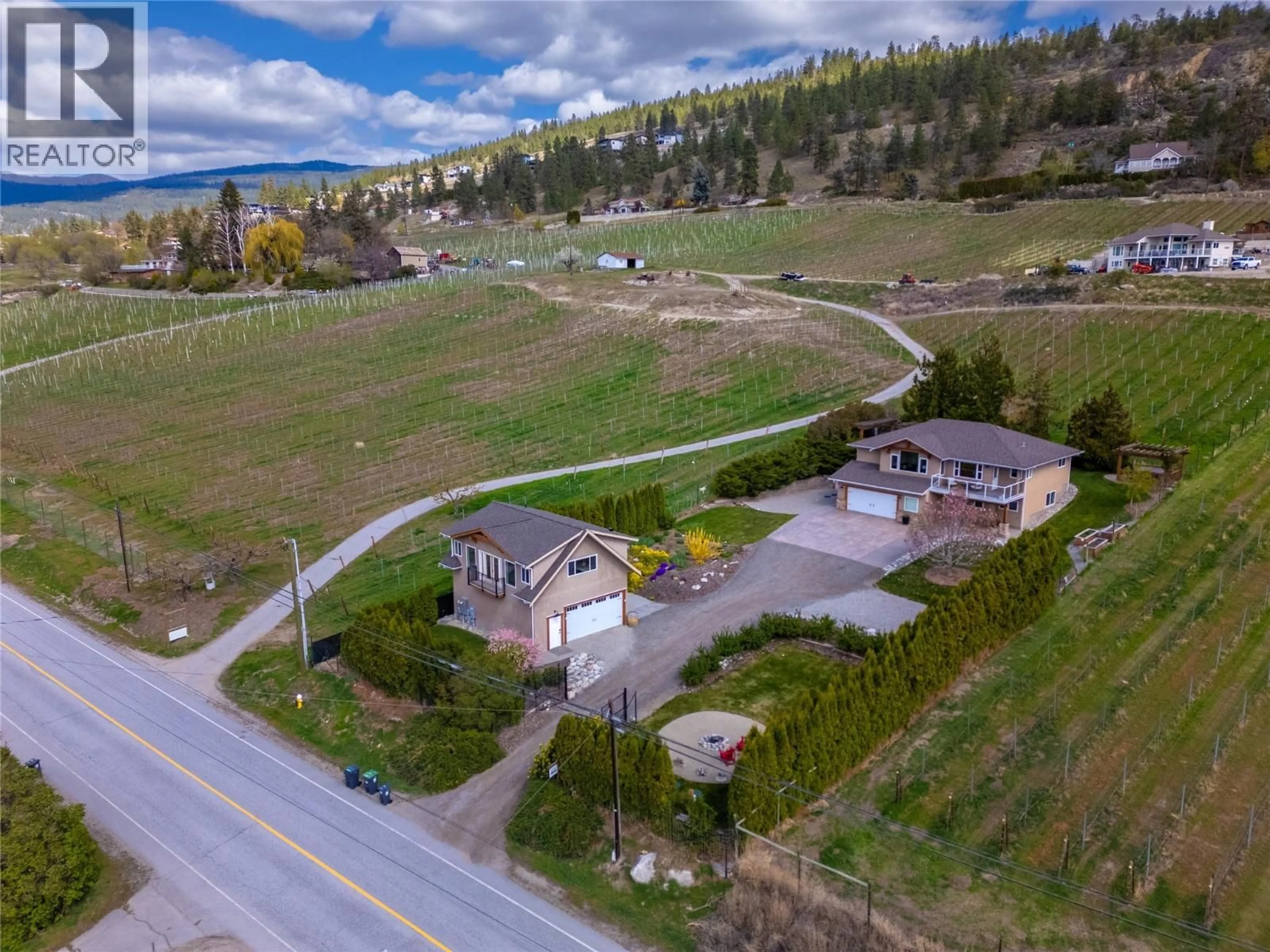 A pic from outside/outdoor area/front of a property/back of a property/a pic from drone, mountain view for 2330 NARAMATA ROAD, Naramata British Columbia V0H1N1