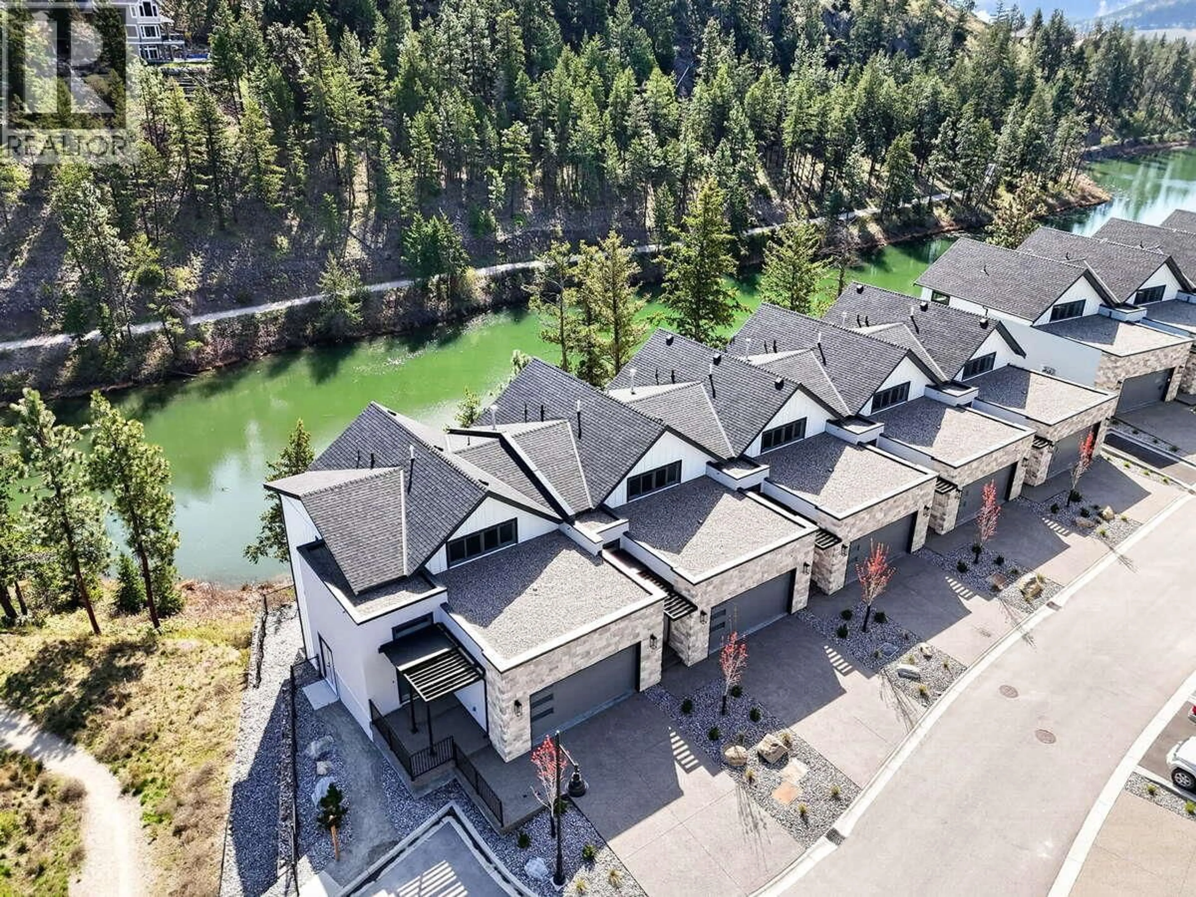 A pic from outside/outdoor area/front of a property/back of a property/a pic from drone, water/lake/river/ocean view for 60 - 1550 UNION ROAD, Kelowna British Columbia V1V0G5