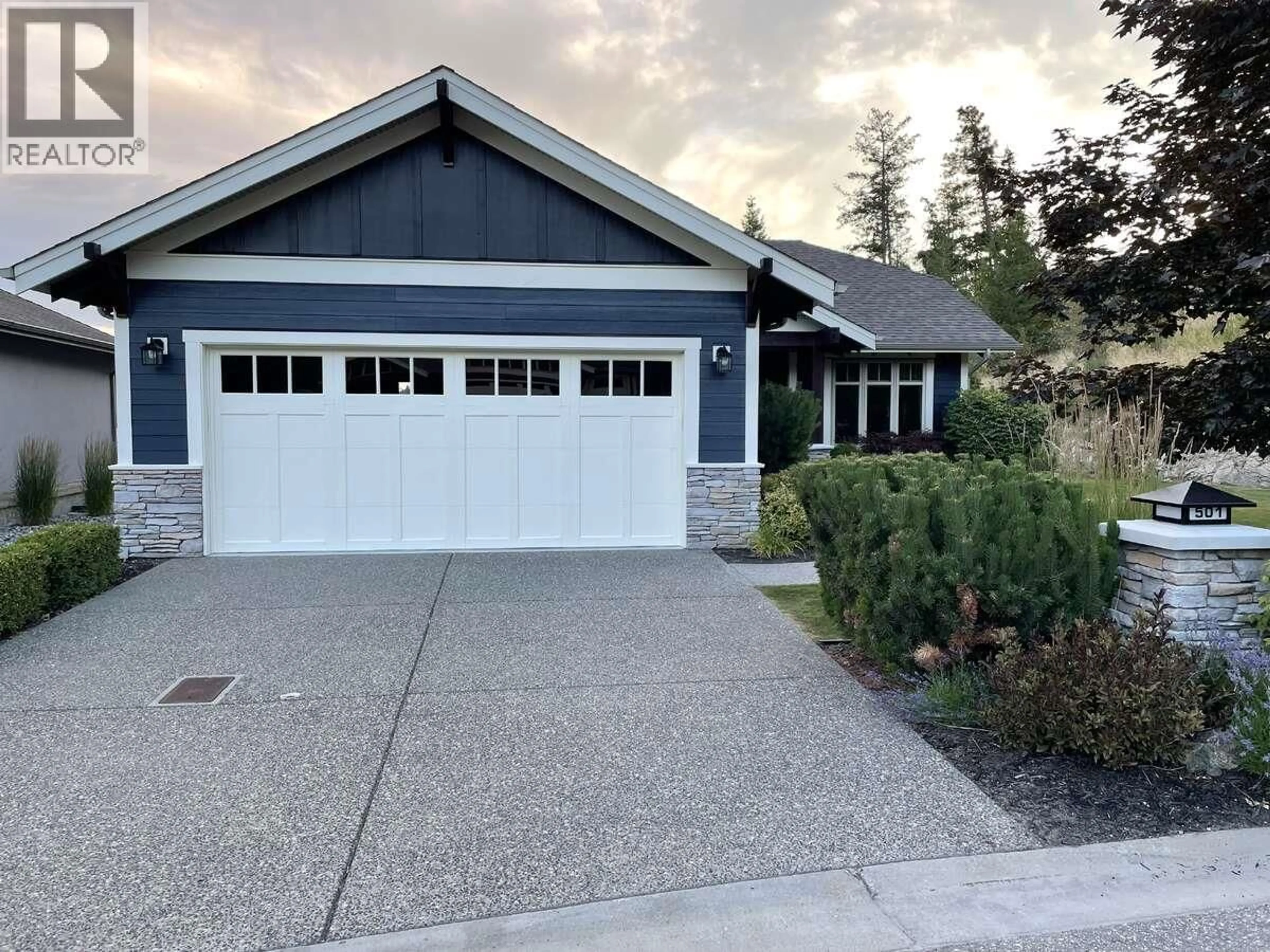 Home with vinyl exterior material, street for 501 LONGSPOON BAY, Vernon British Columbia V1H2K2