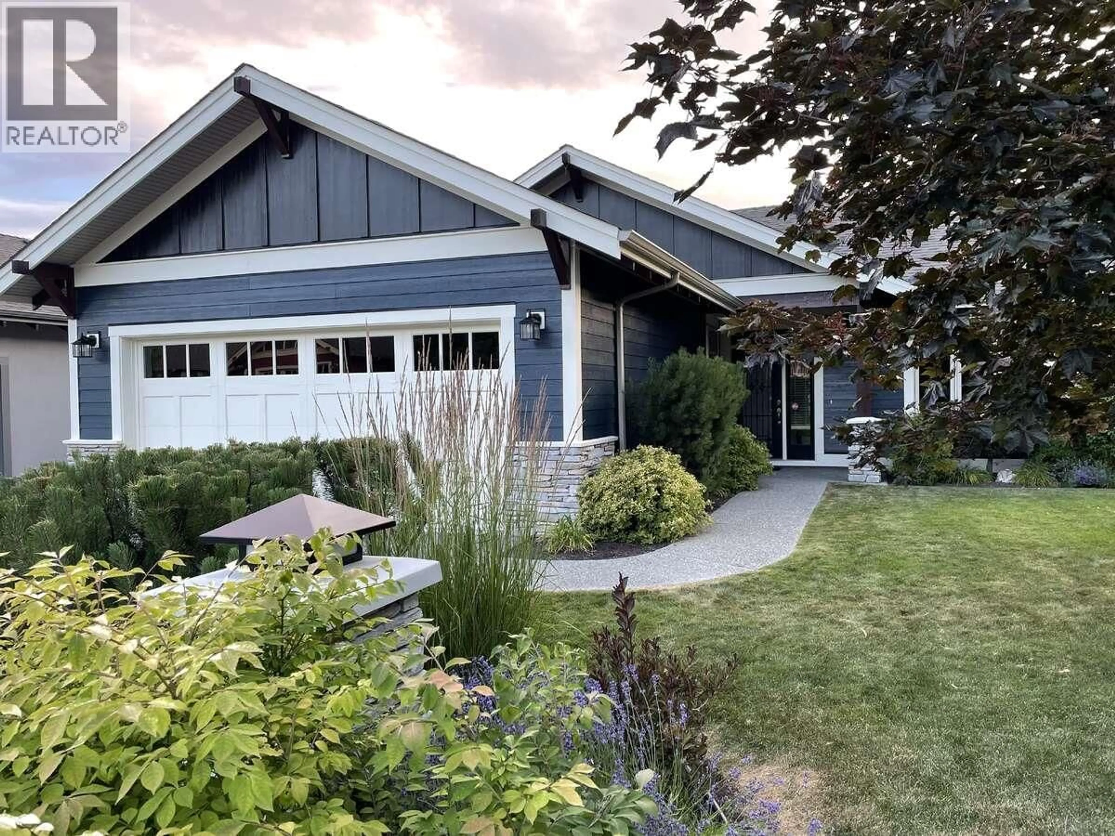 Home with vinyl exterior material, street for 501 LONGSPOON BAY, Vernon British Columbia V1H2K2