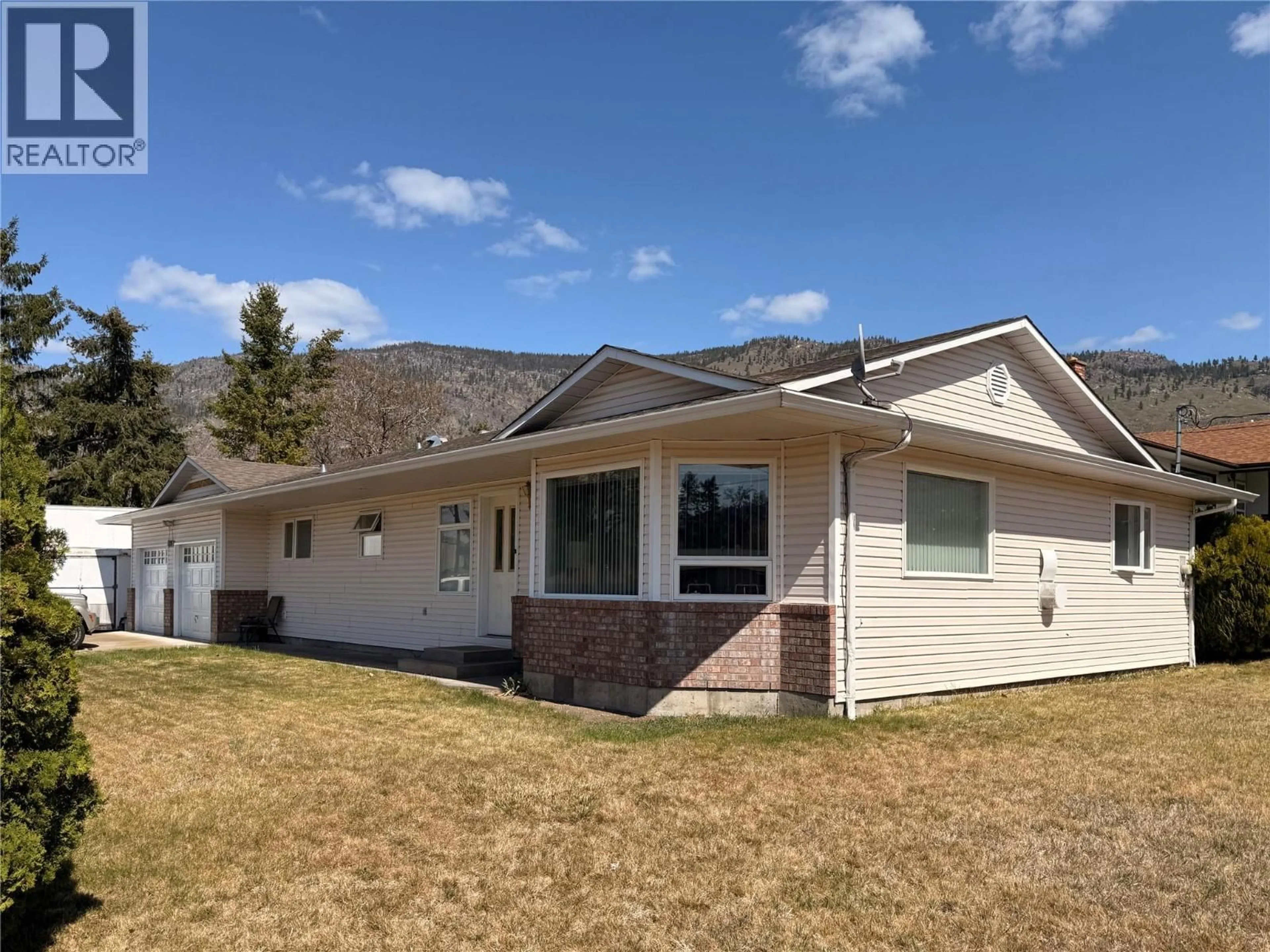Home with vinyl exterior material, mountain view for 25 WILLOW CRESCENT, Osoyoos British Columbia V0H1V3