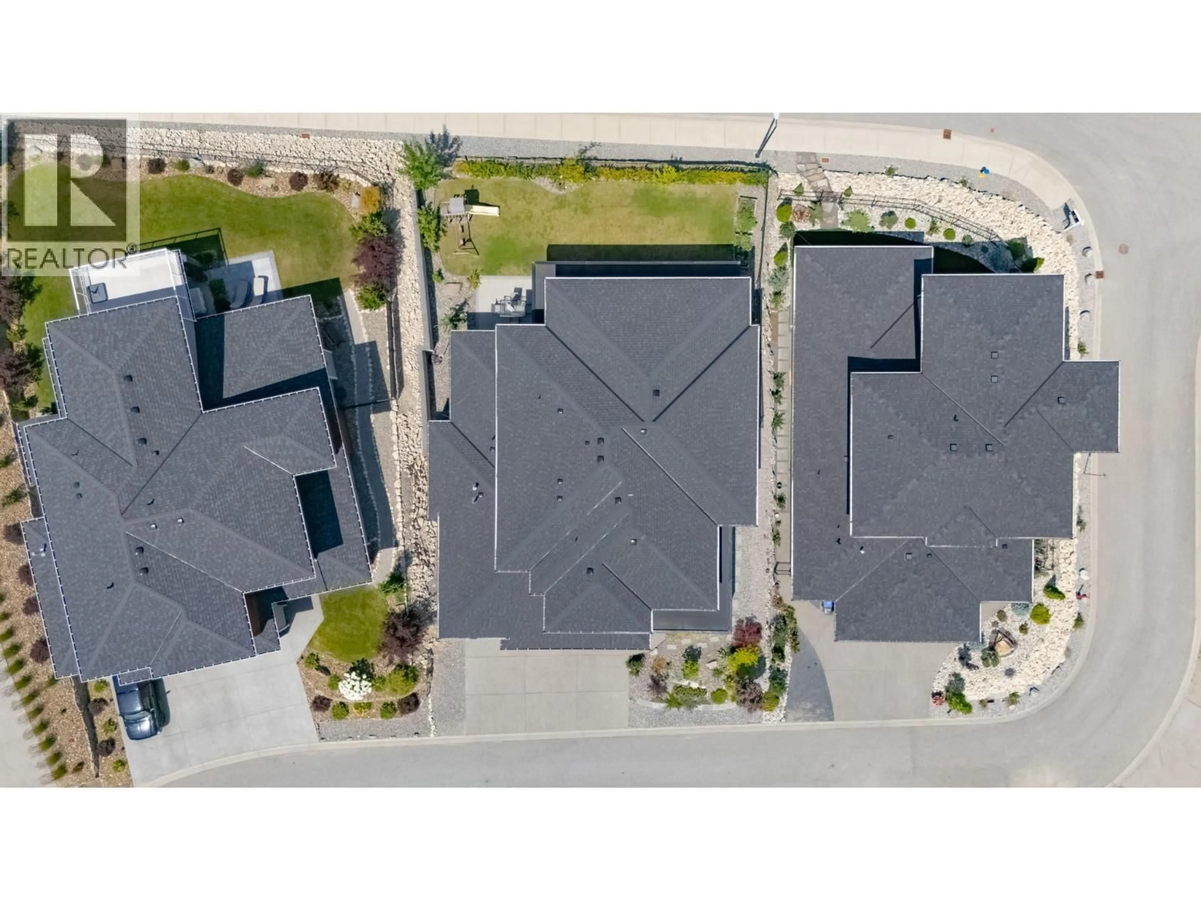 A pic from outside/outdoor area/front of a property/back of a property/a pic from drone, street for 550 BARRA LANE, Kelowna British Columbia V1P1T3