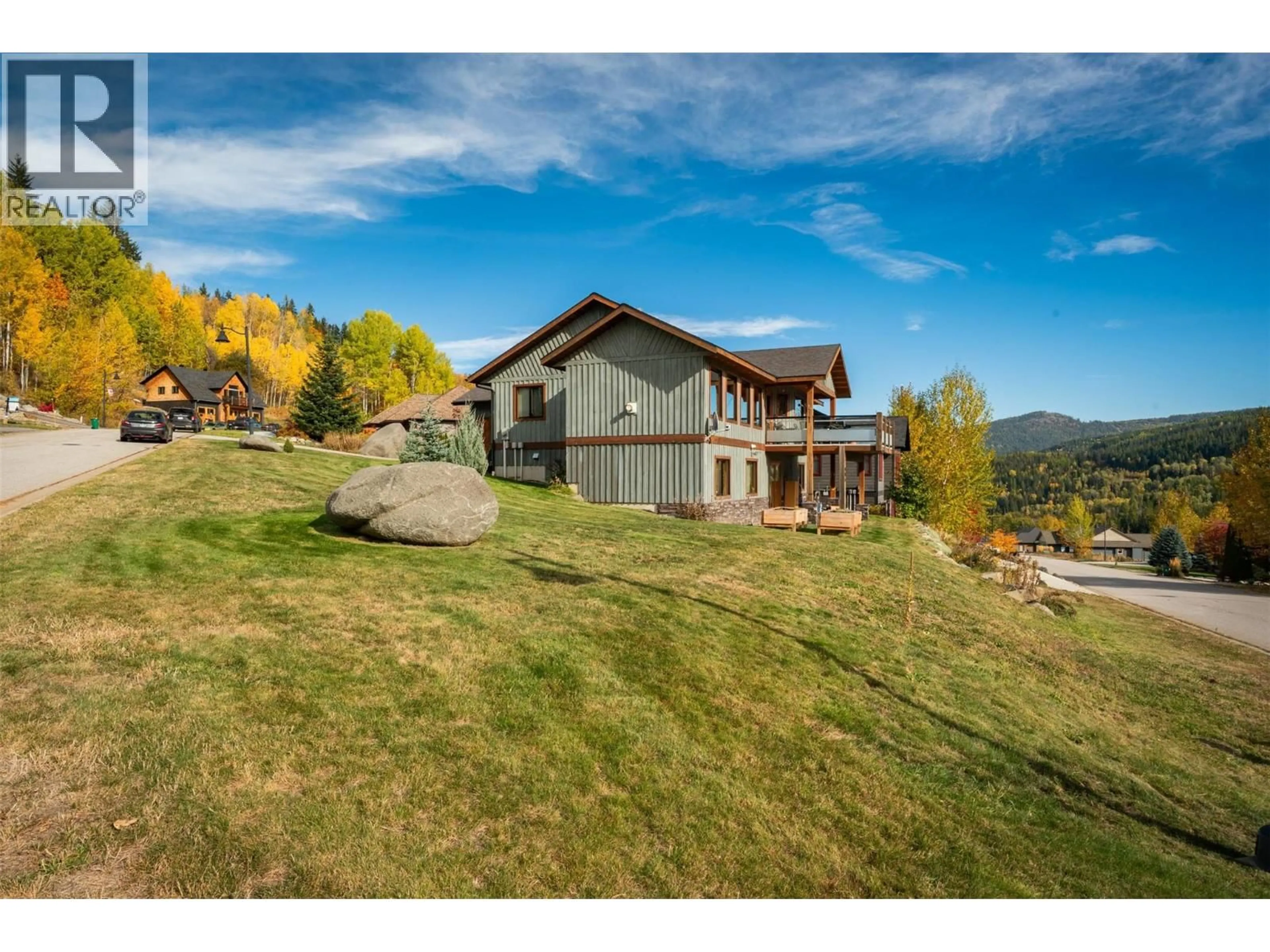 A pic from outside/outdoor area/front of a property/back of a property/a pic from drone, mountain view for 904 REDSTONE DRIVE, Rossland British Columbia V0G1Y0