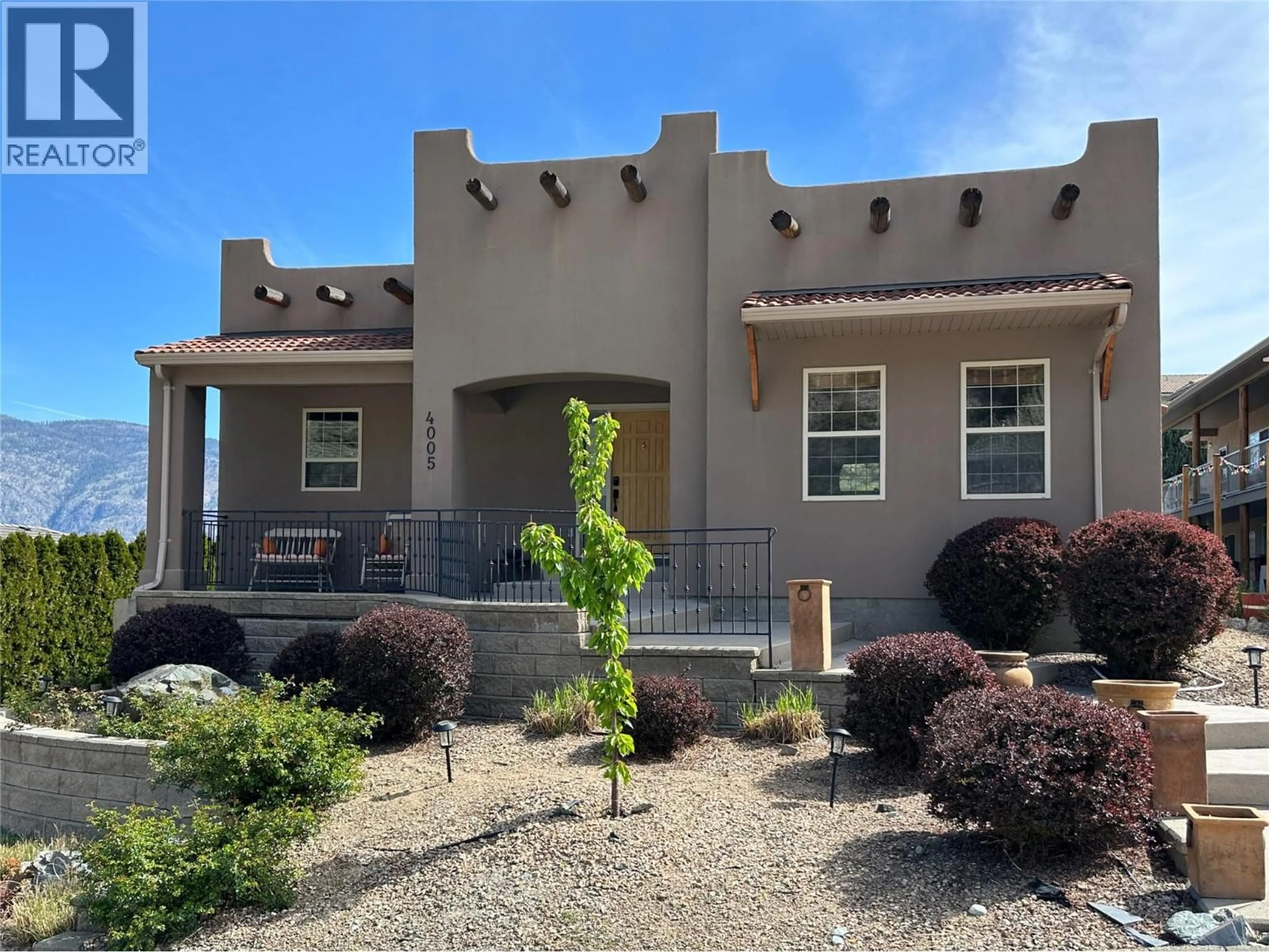 Home with vinyl exterior material, street for 4005 FAIRWINDS DRIVE, Osoyoos British Columbia V0H1V4