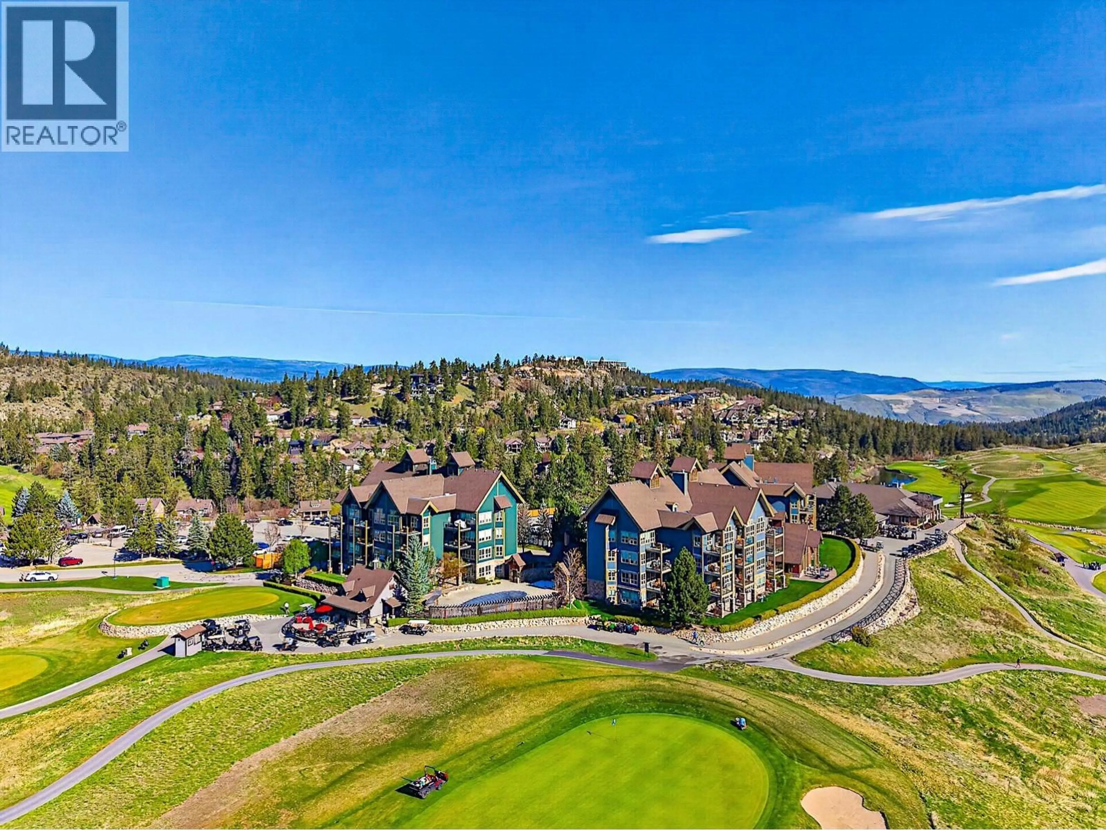 A pic from outside/outdoor area/front of a property/back of a property/a pic from drone, mountain view for 232 - 101 VILLAGE CENTRE COURT, Vernon British Columbia V1H1Y8